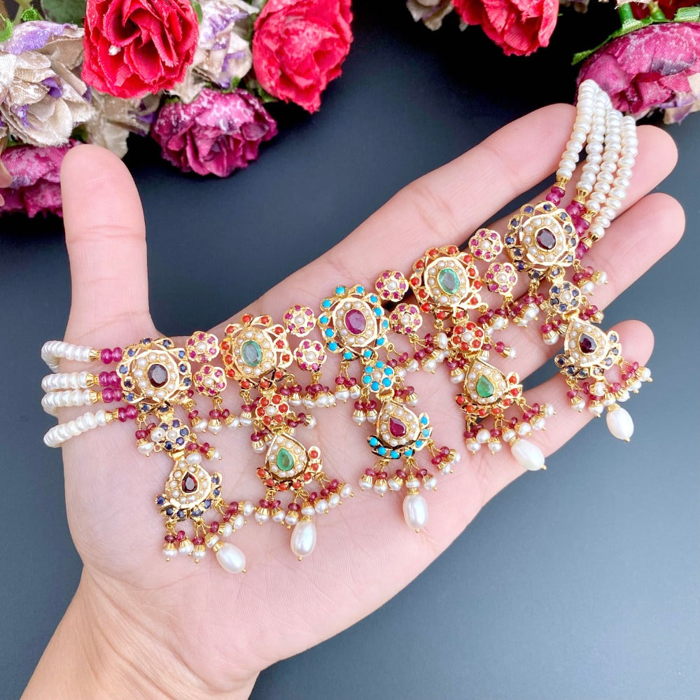 shop indian jewellery in usa online with a vast collection of neckalces, earrings, jhumkas, chandbalis, bangles, bracelets, pendant sets and various color stones like ruby emerald pearls navratna blue sapphires coral and turquoises