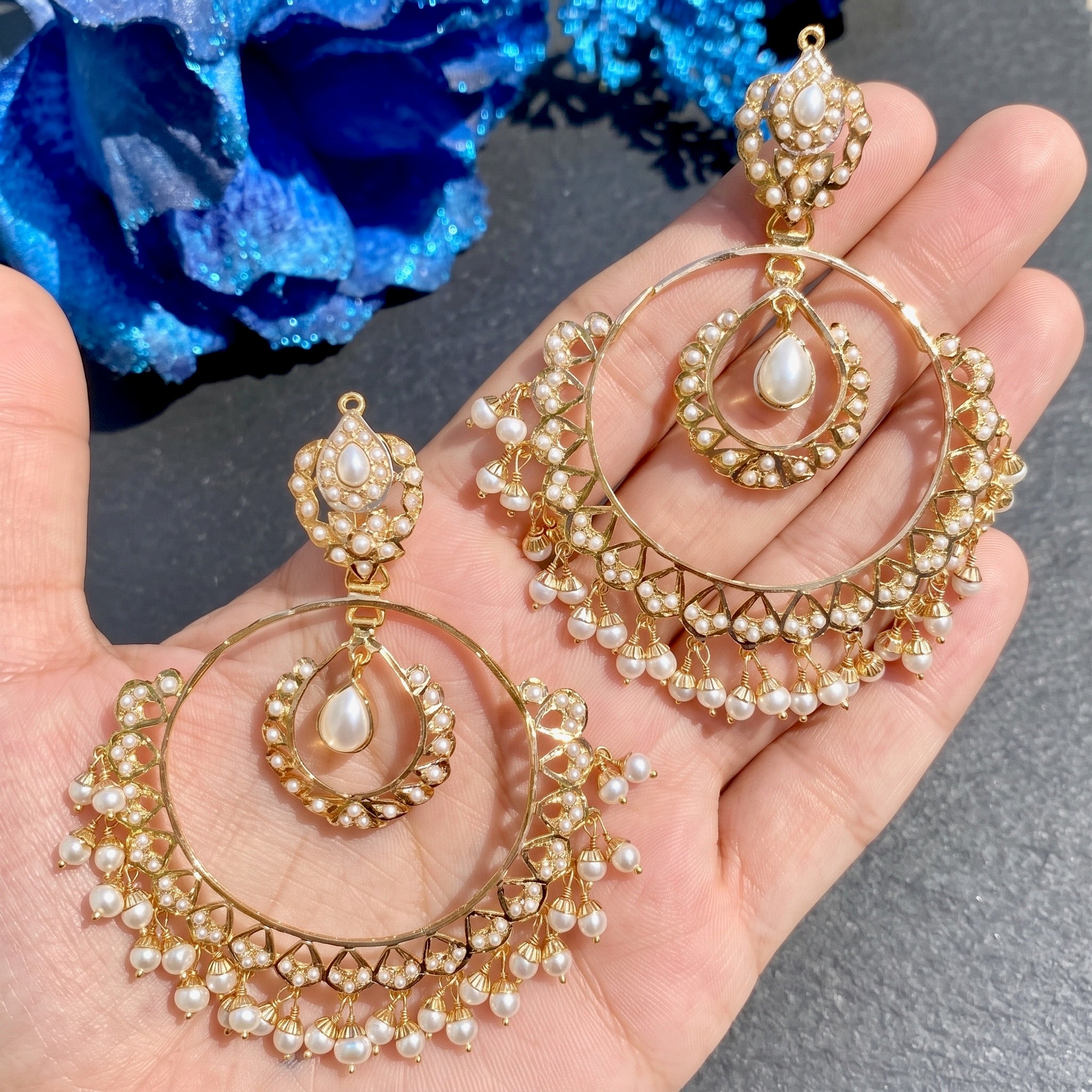 gold chandbali earrings studded with pearls