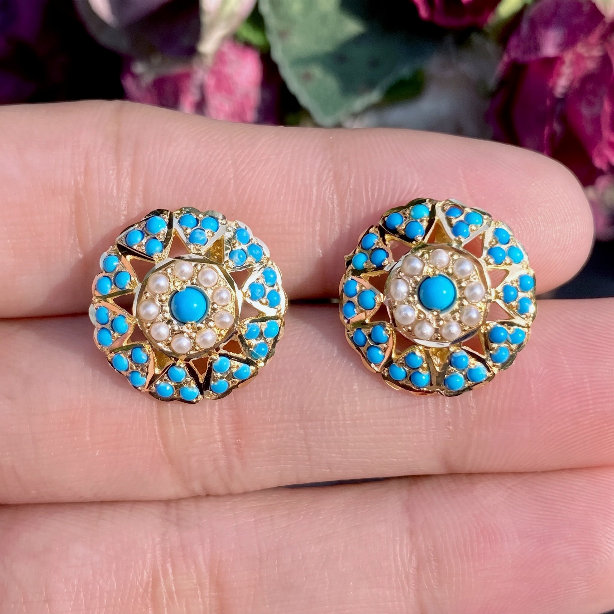 jadau stud earrings studded with pearls and firoza