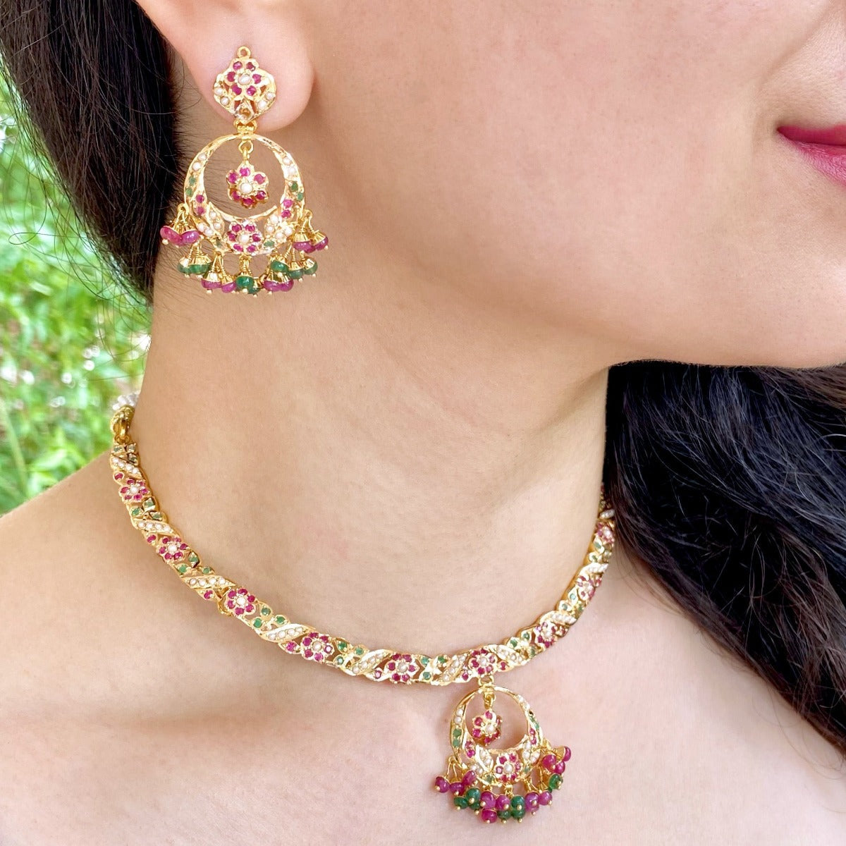 traditional indian hasli necklace paired with chandbali earrings