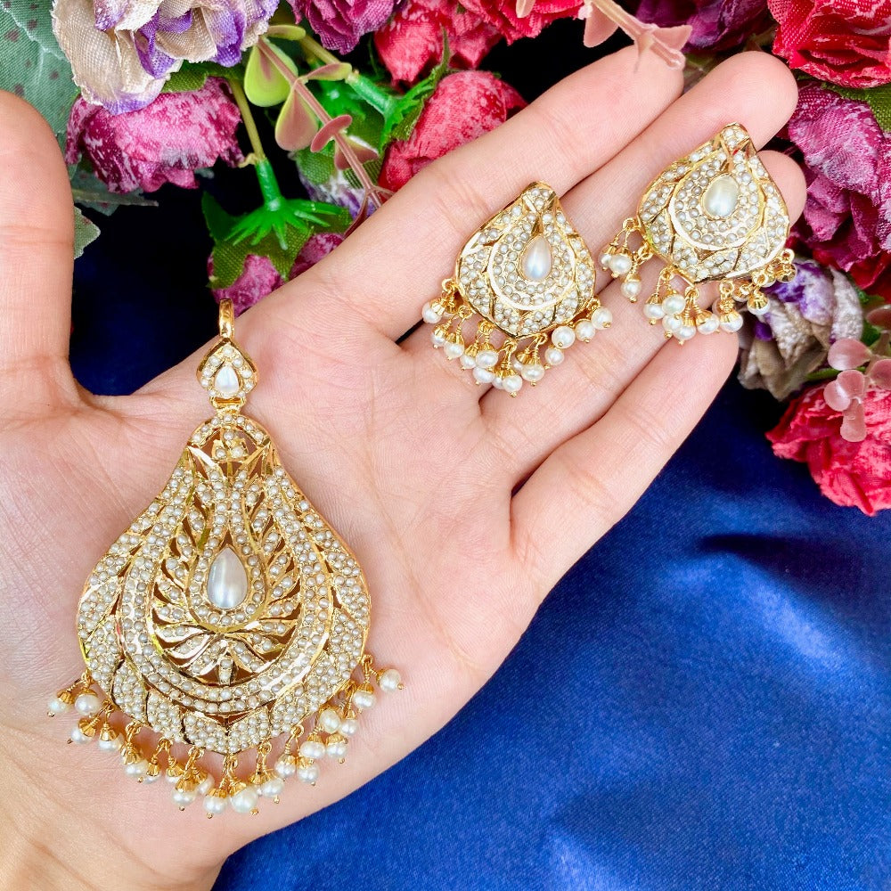 gold plated pendant set studded with real pearls