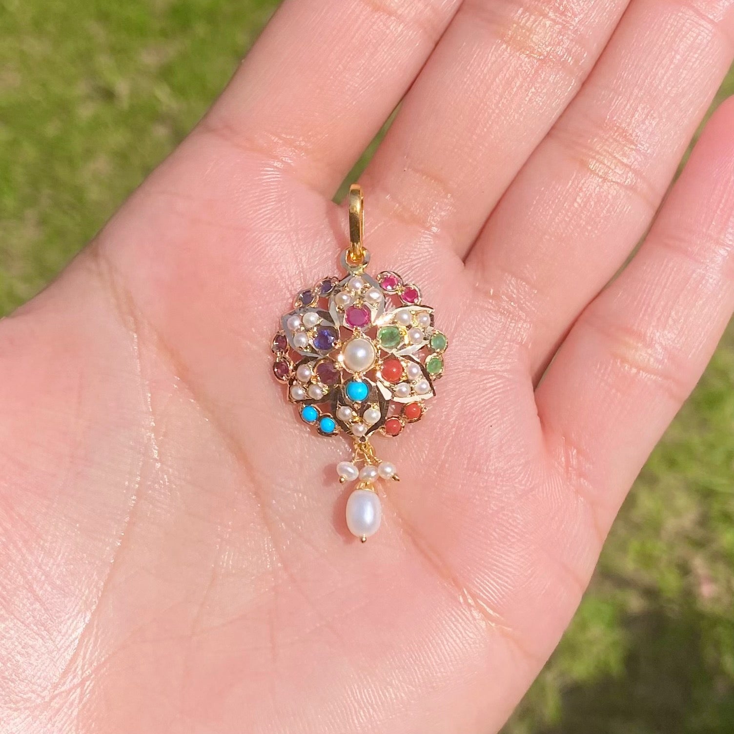 round navratna pendant only in 22k gold studded with precious stones gp 9