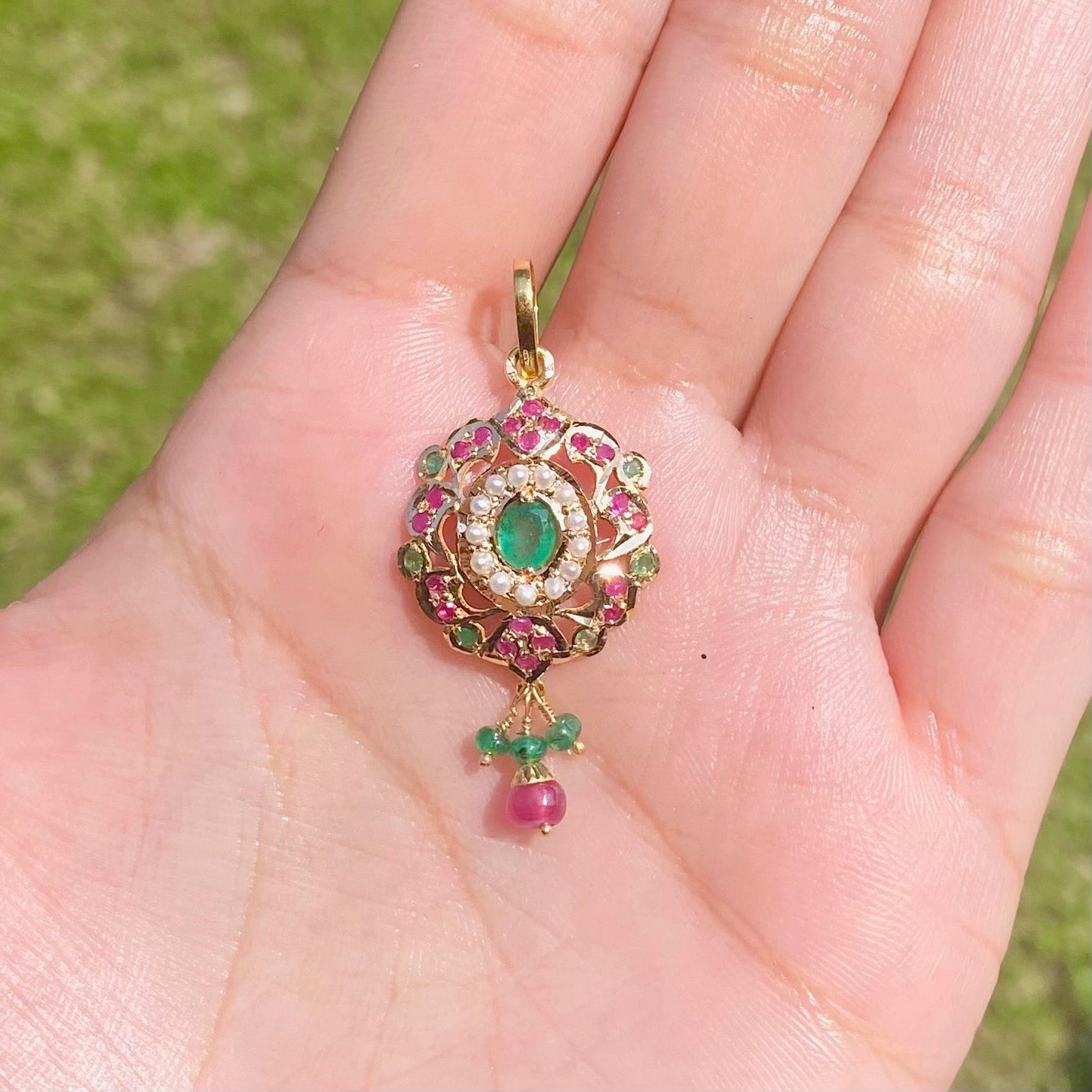 delicate pendant only in 22k gold studded with rubies emeralds and pearls gp 004