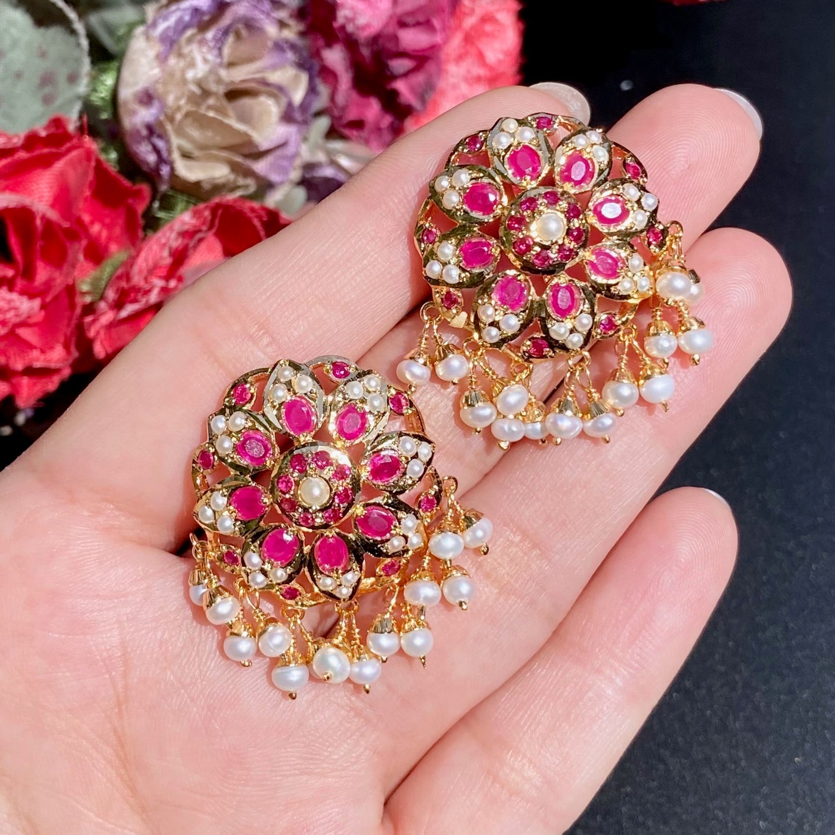 jadau set with ruby like red stones