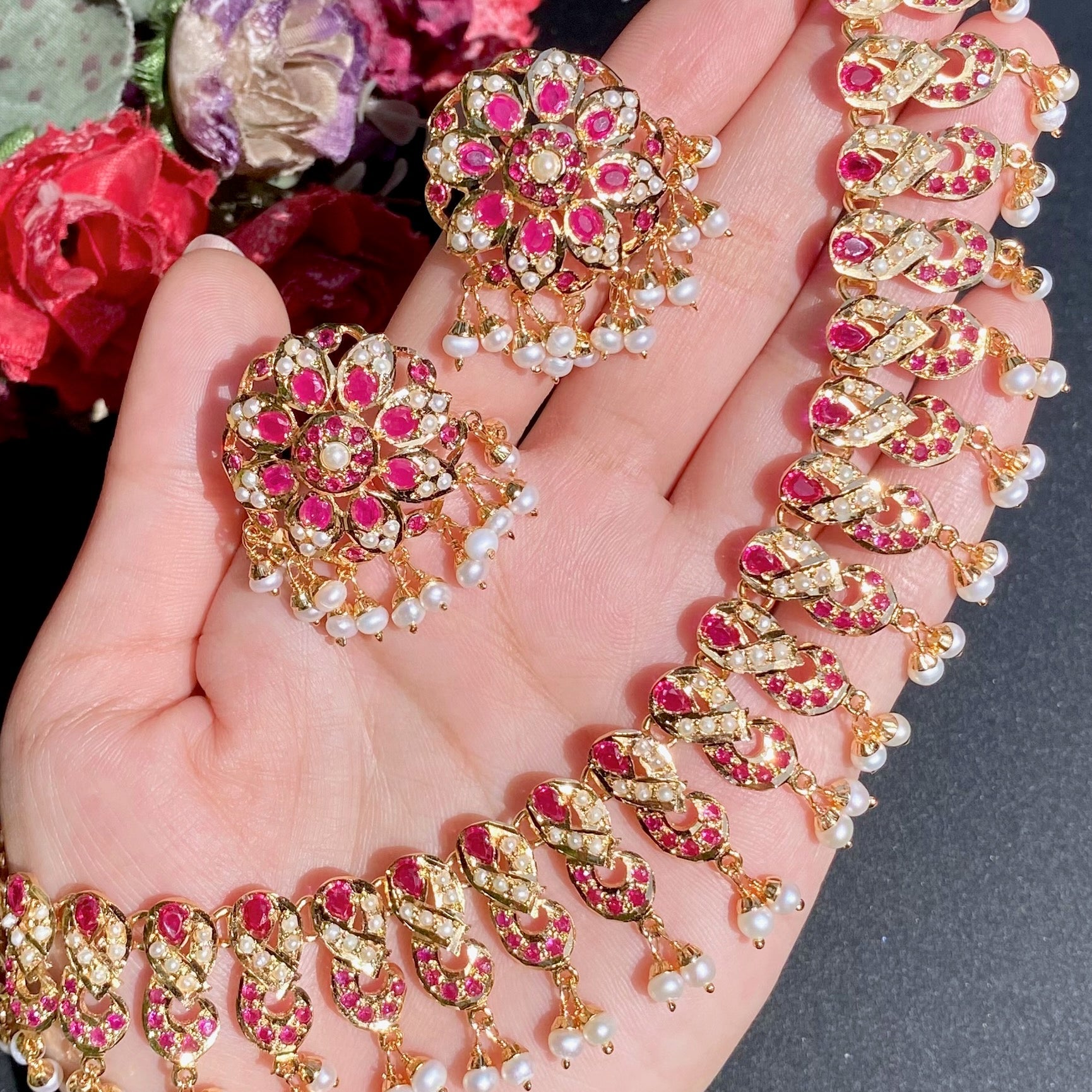 jadau set with ruby like red stones