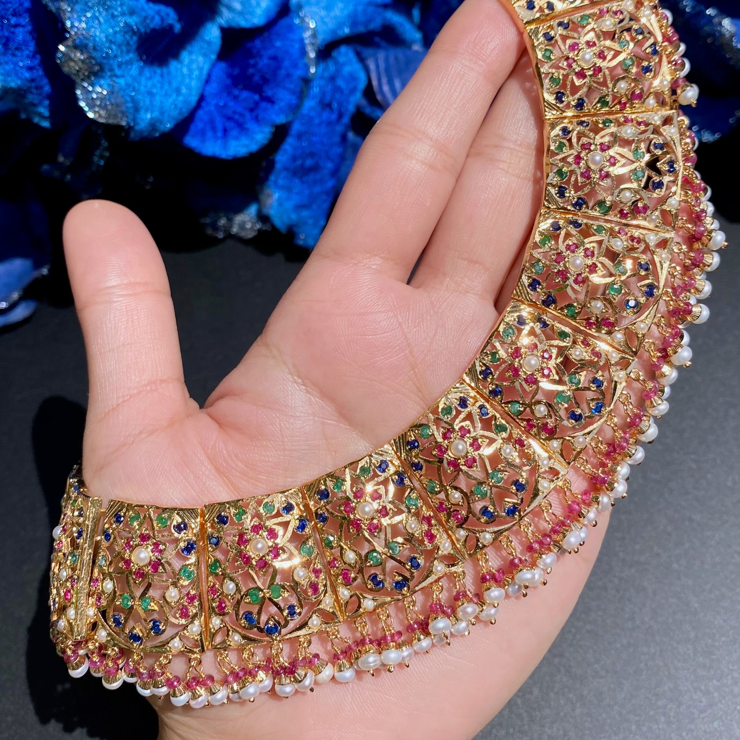 broad necklace set with neelam blue sapphire stones