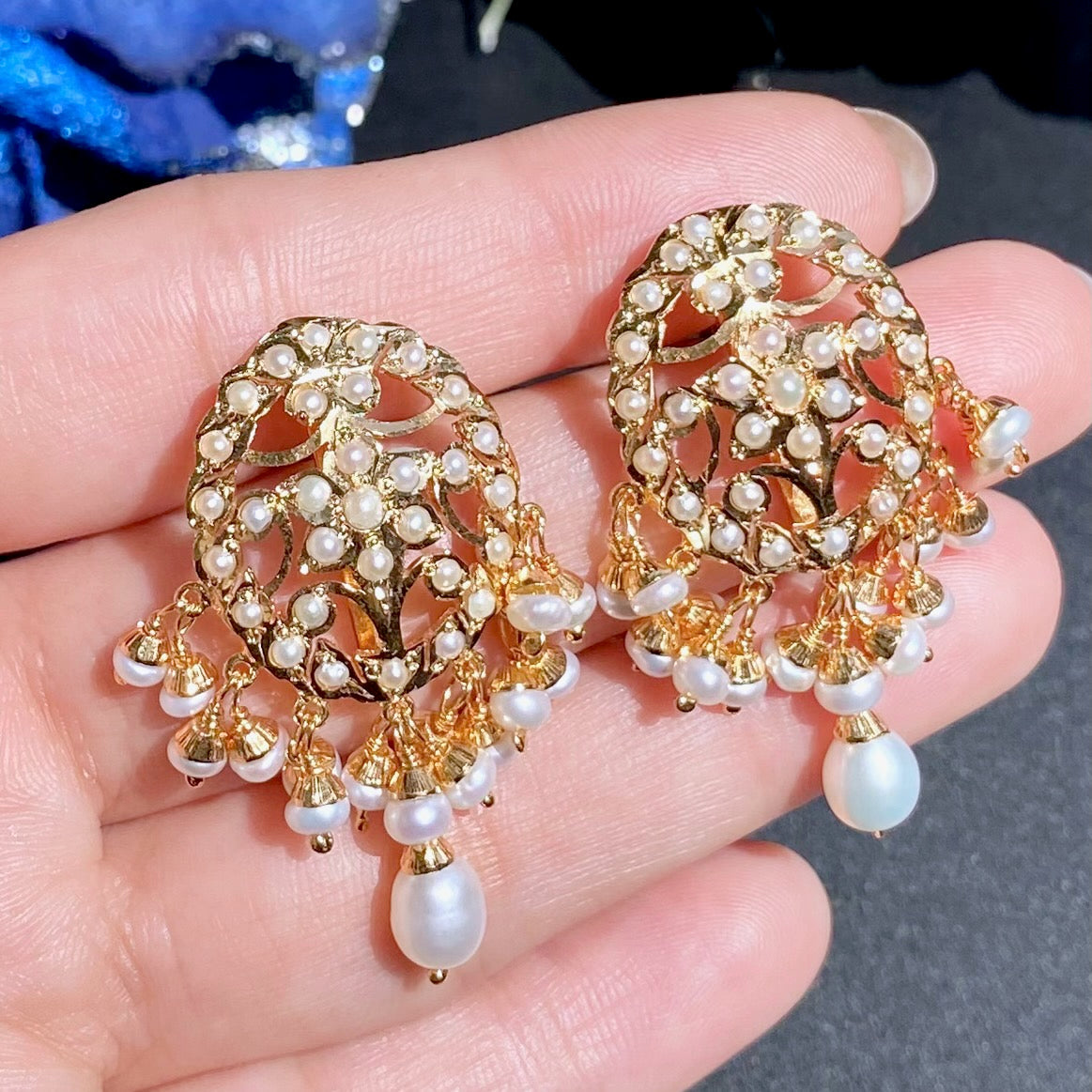 gold plated pearl choker on silver base