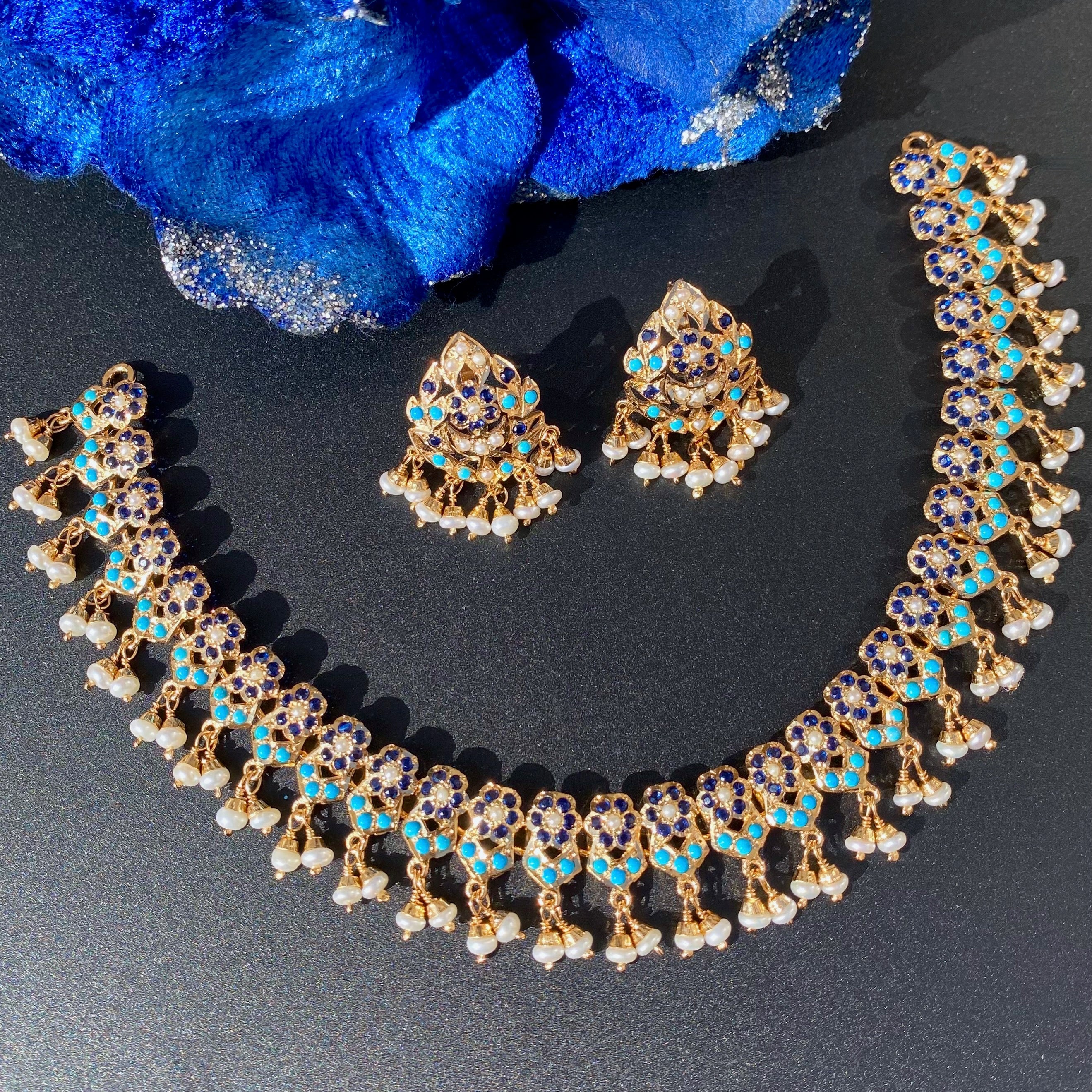 delicate pakistani necklace studded with blue stones