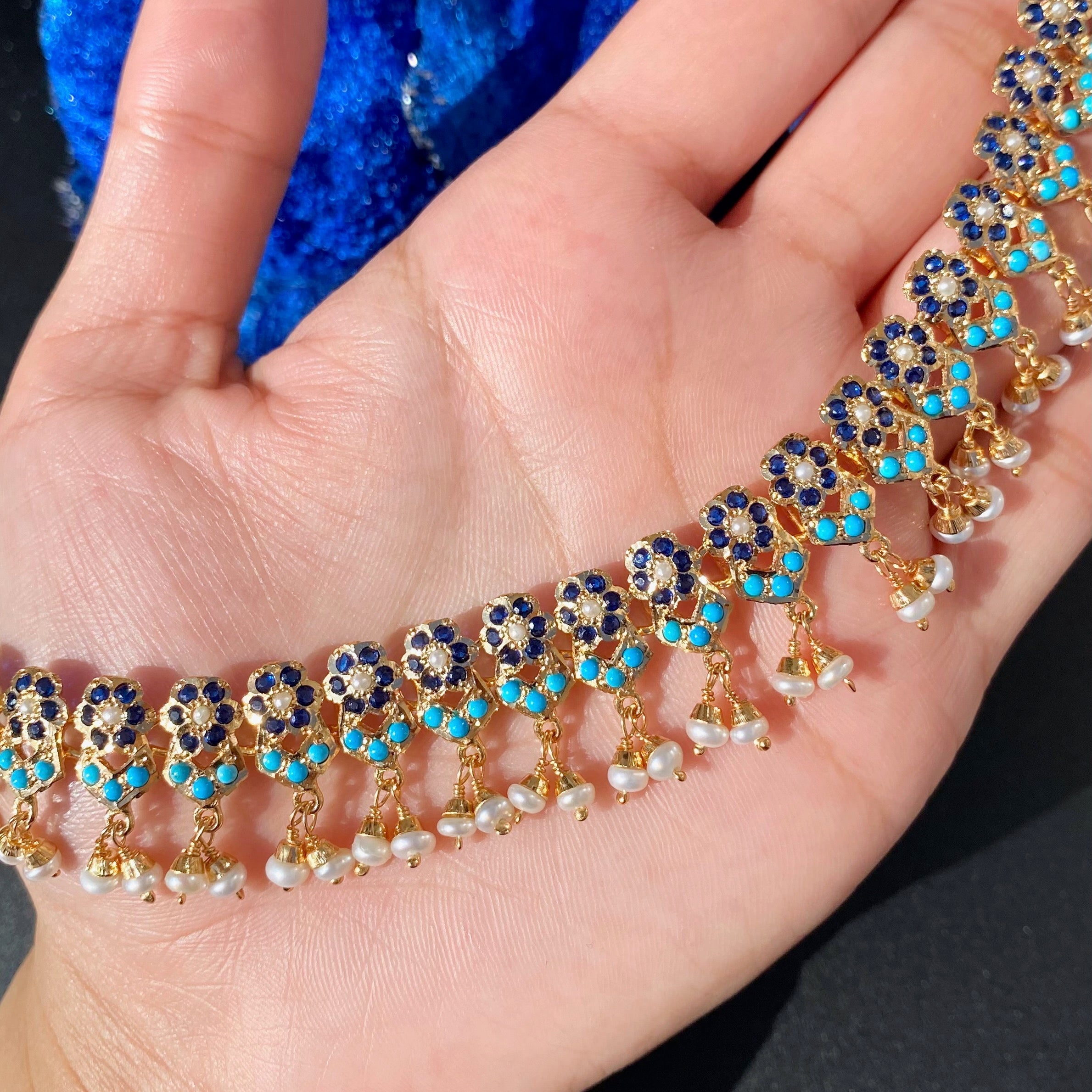 delicate pakistani necklace studded with blue stones