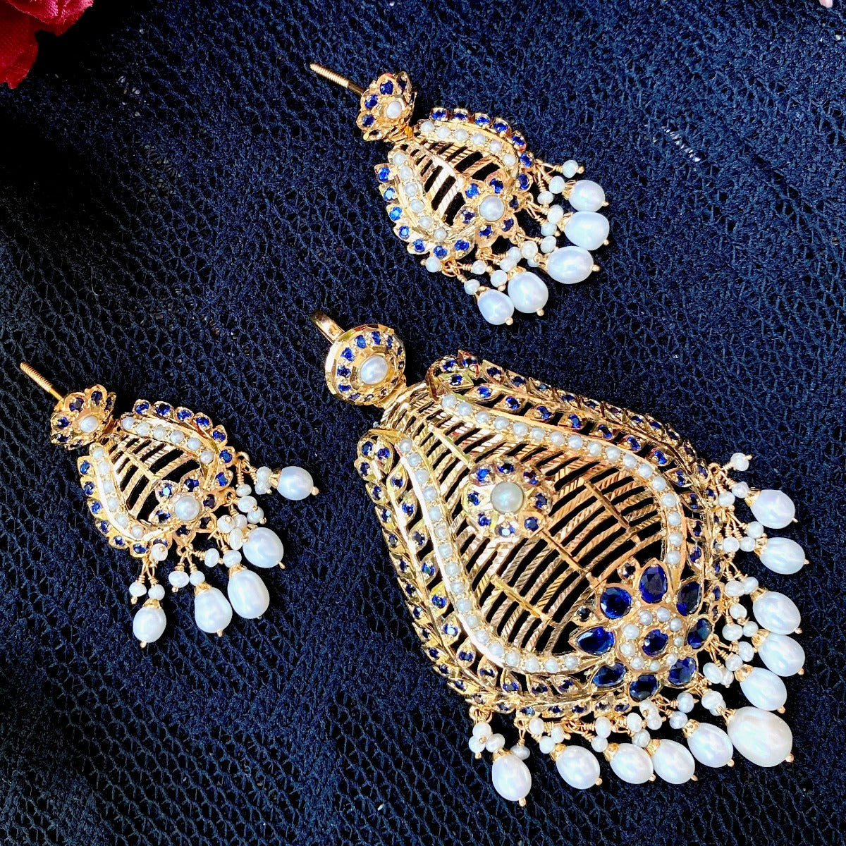large blue sapphire emerald pendant set