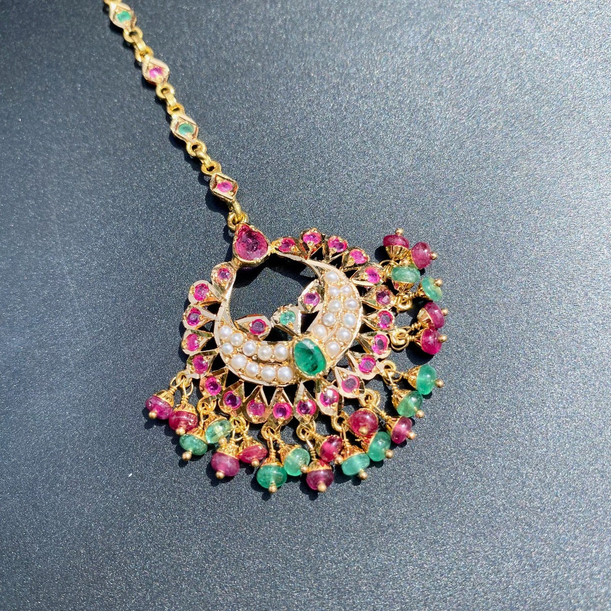 ruby emerald tikka gold