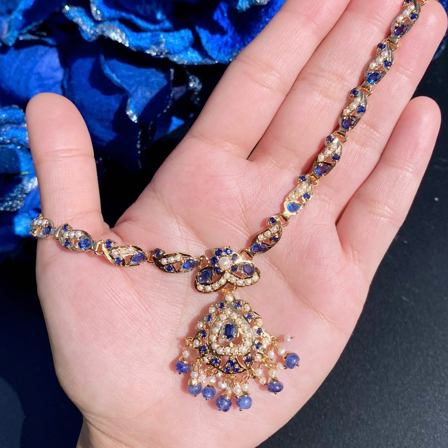 dainty necklace with large earrings