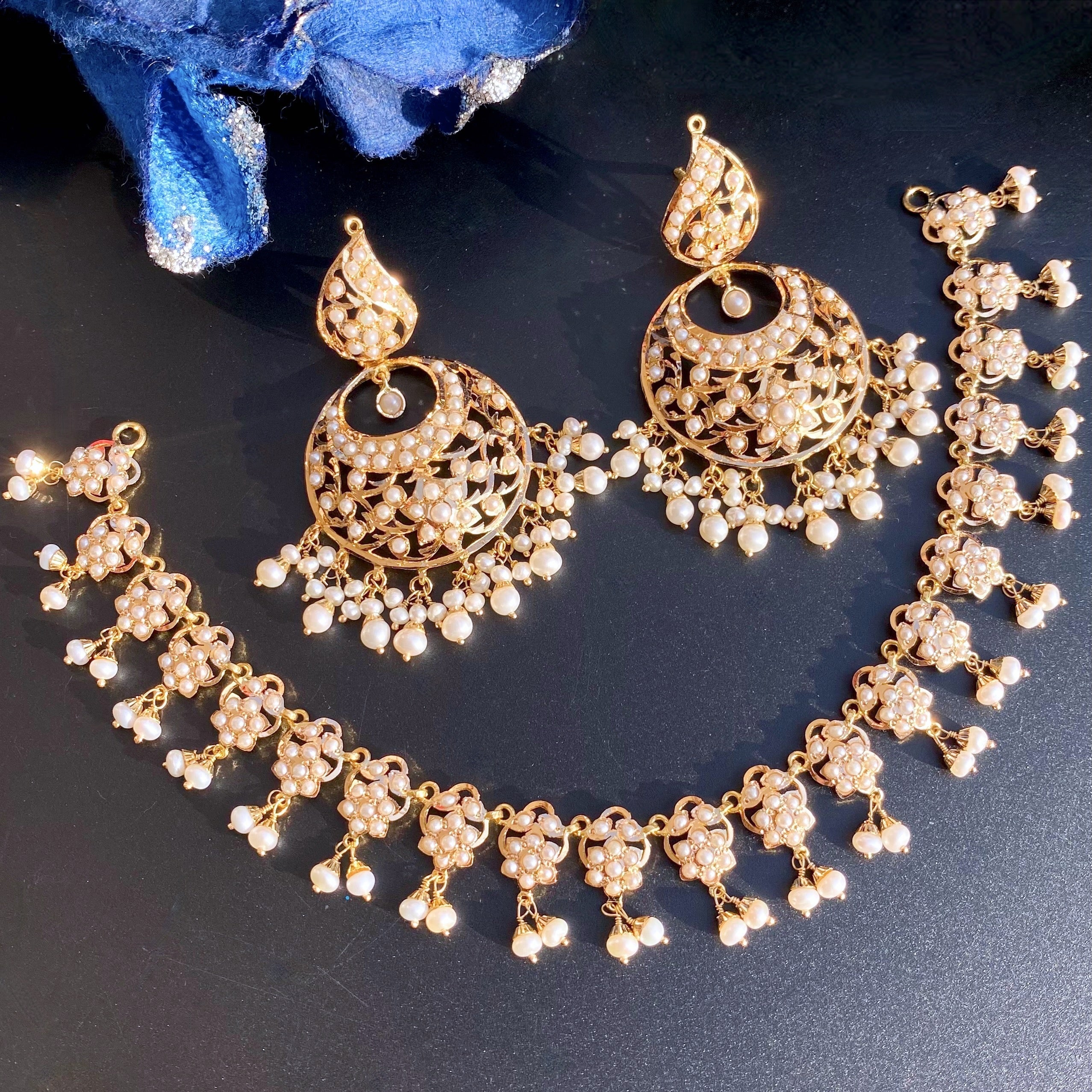 pearl set on gold