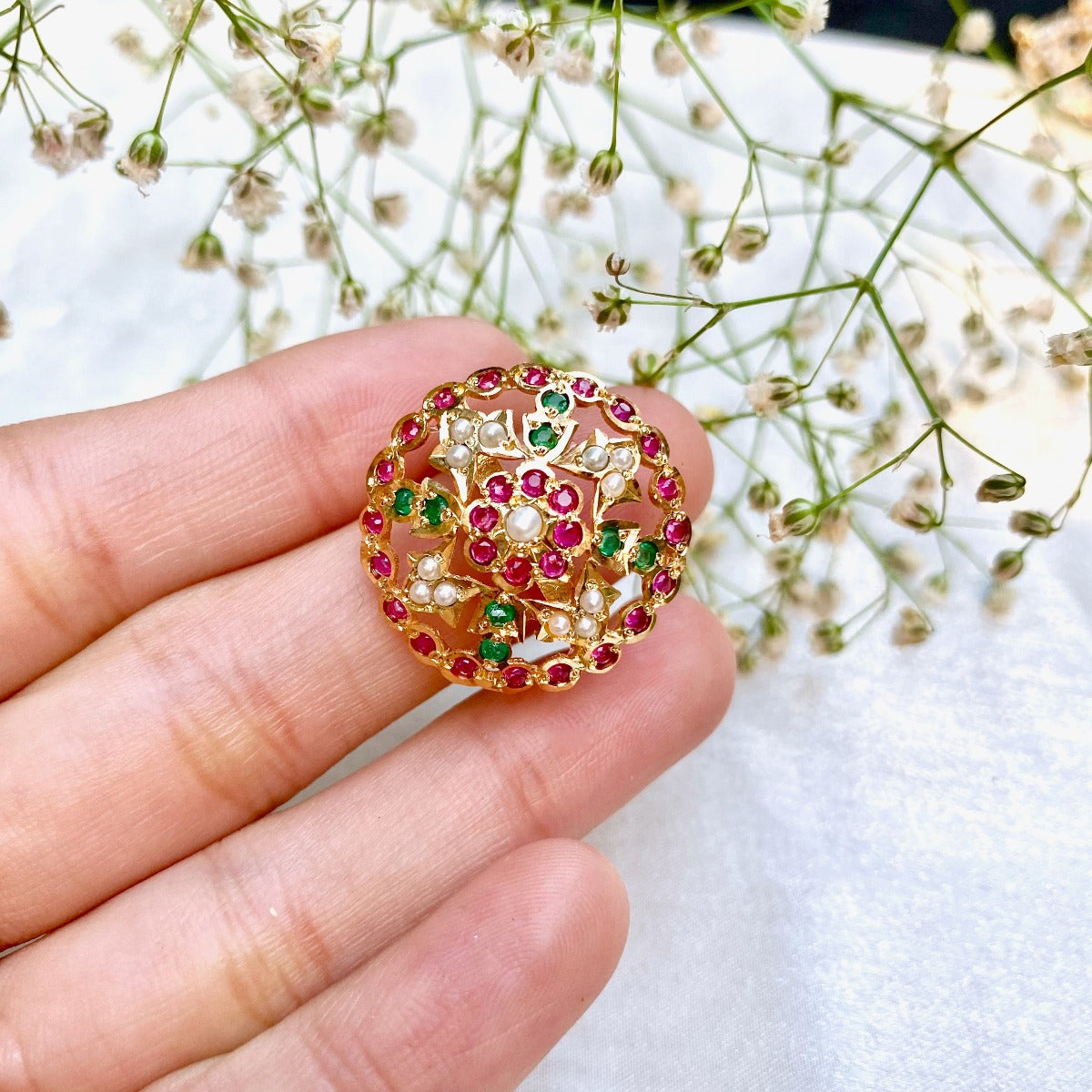 jadau cocktail ring ruby emerald