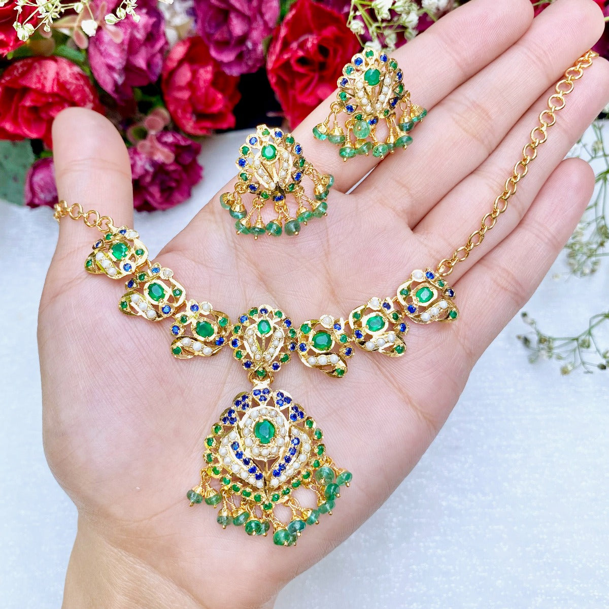jadau chain set emeralds