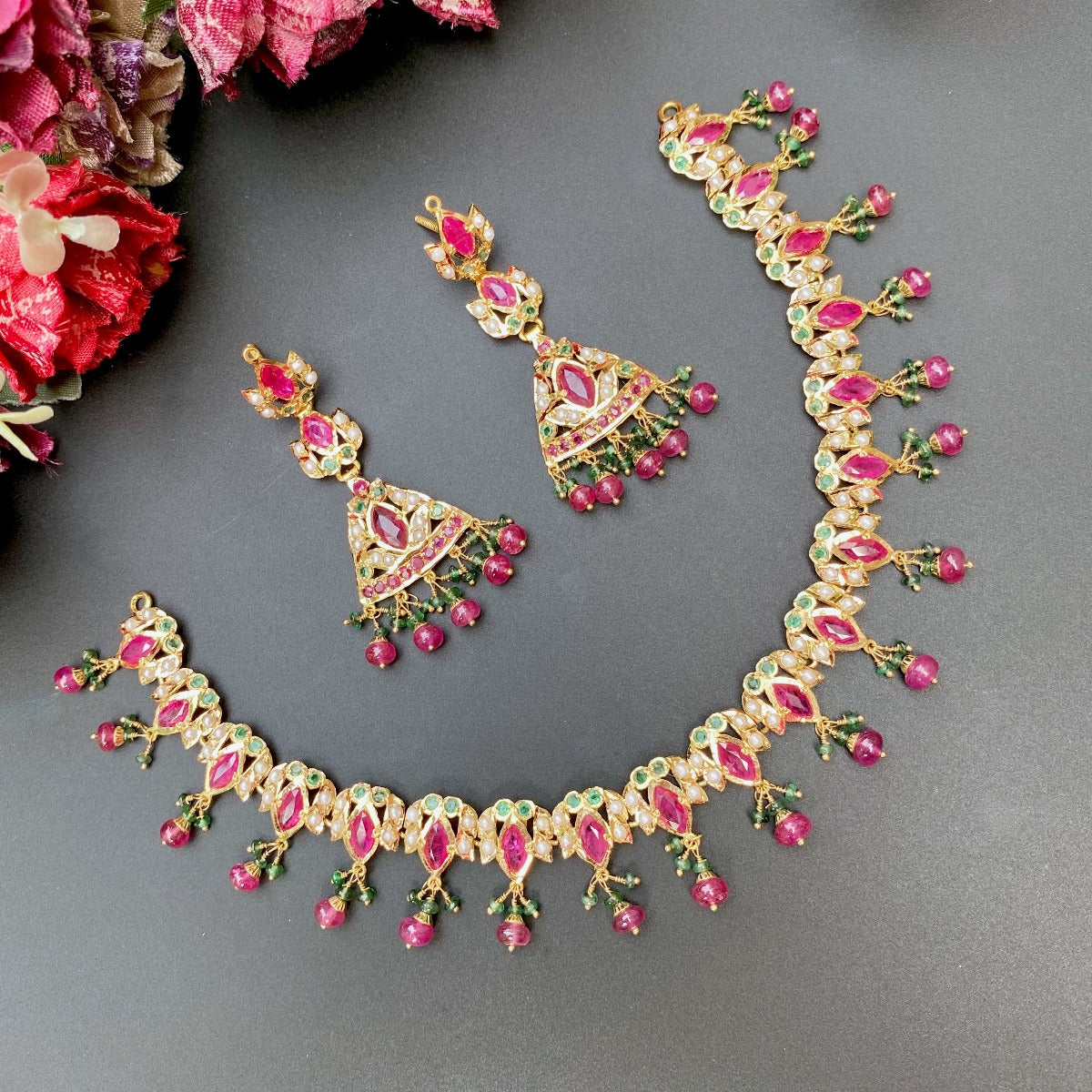 delicate ruby necklace set in 22ct gold