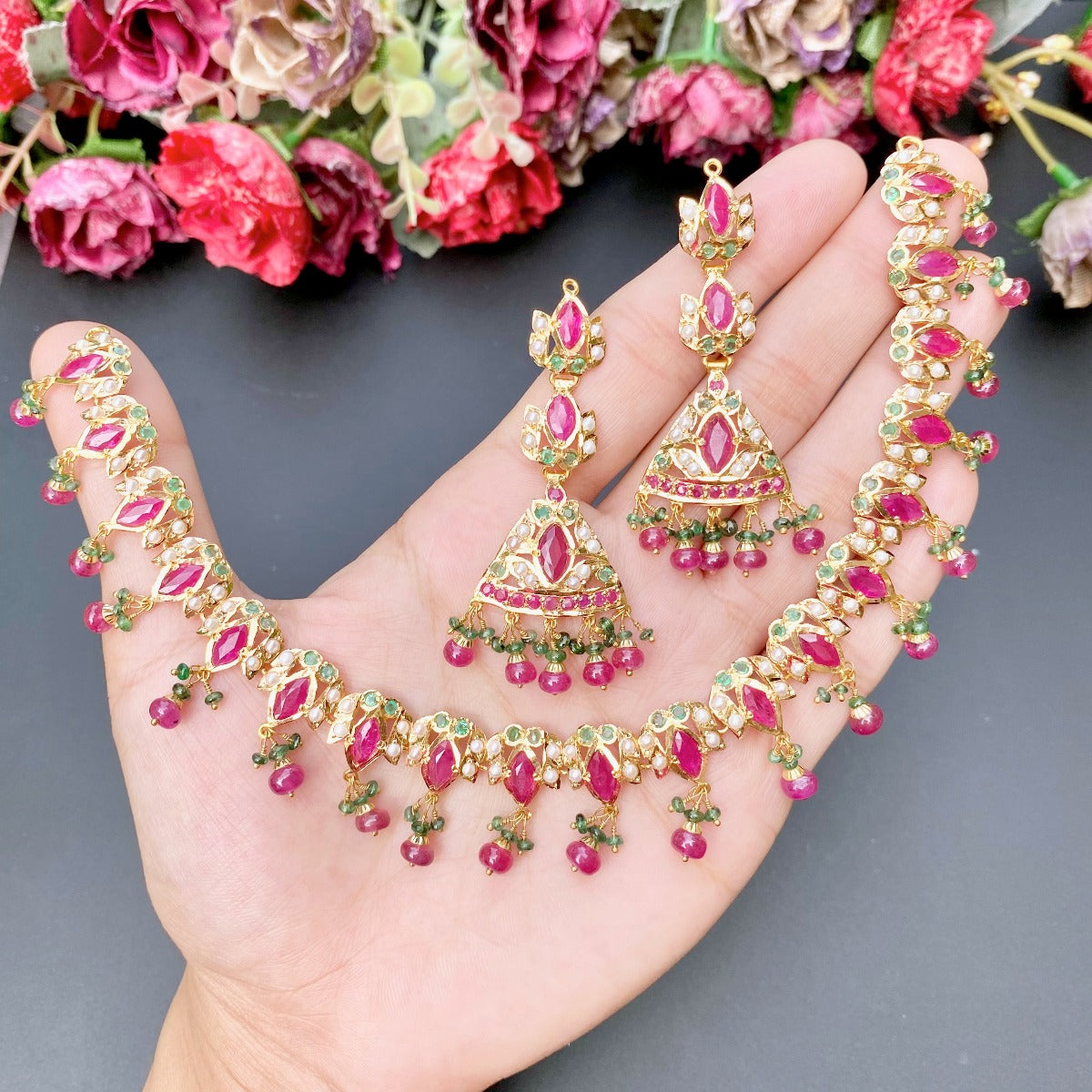 delicate ruby necklace set in 22ct gold