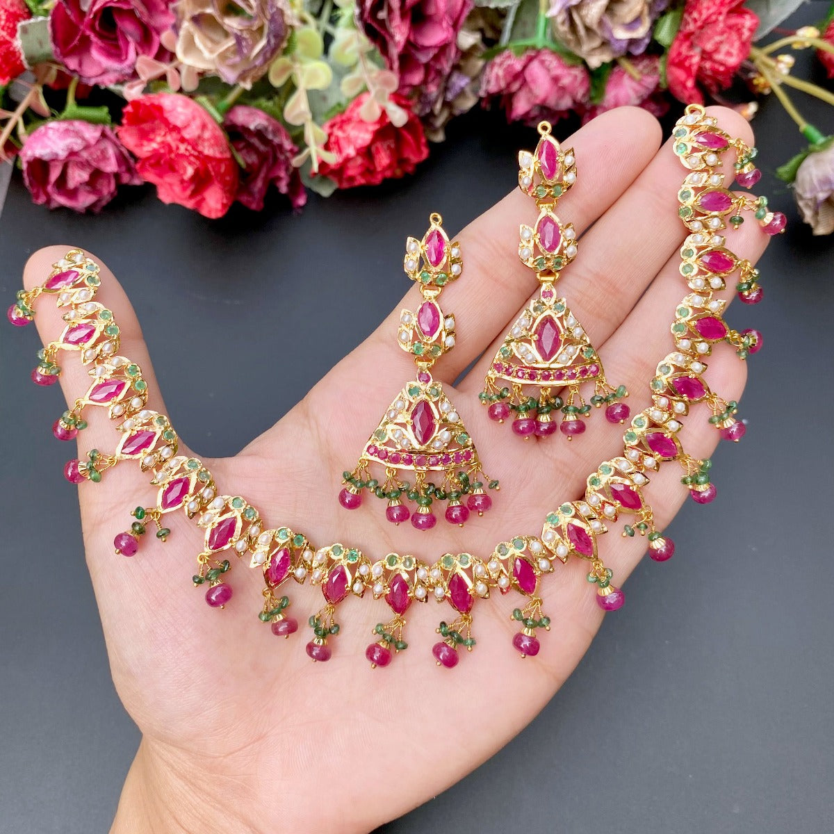 delicate ruby necklace set in 22ct gold