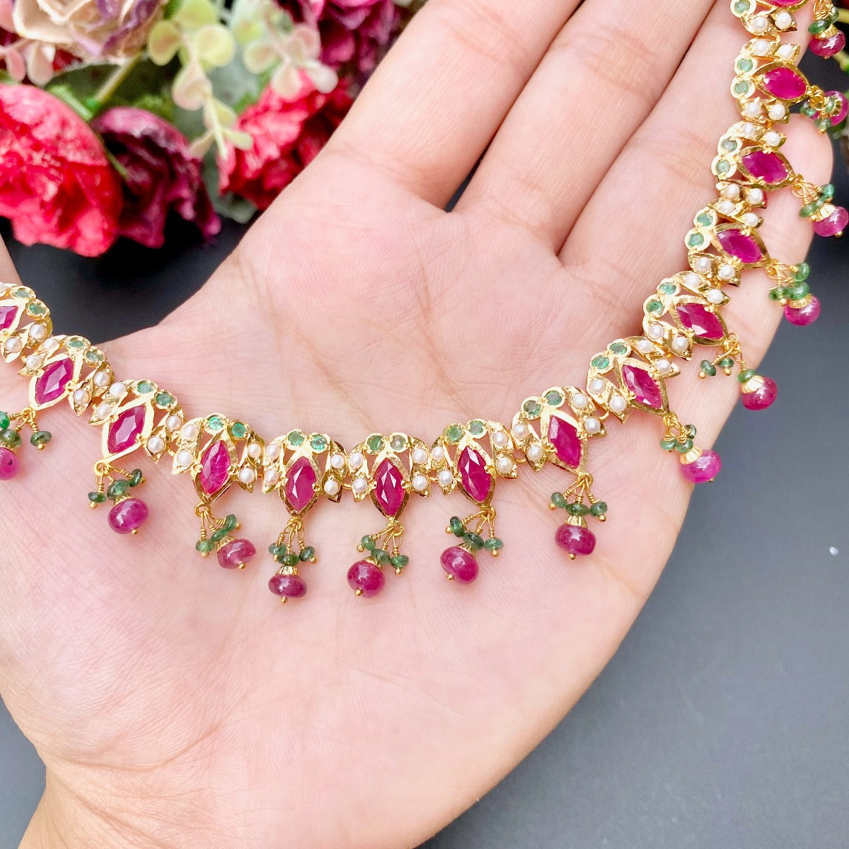 delicate ruby necklace set in 22ct gold