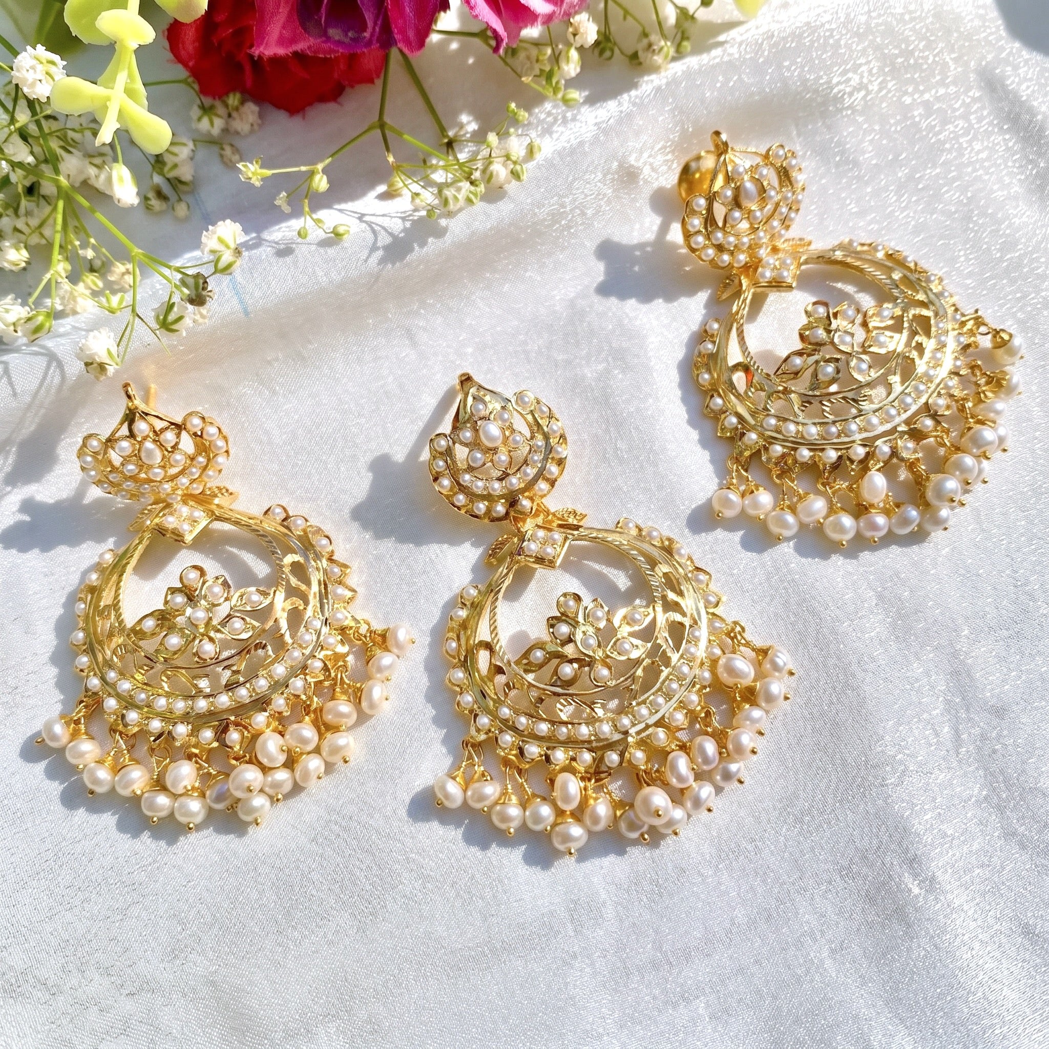 hyderabadi dollar with earrins