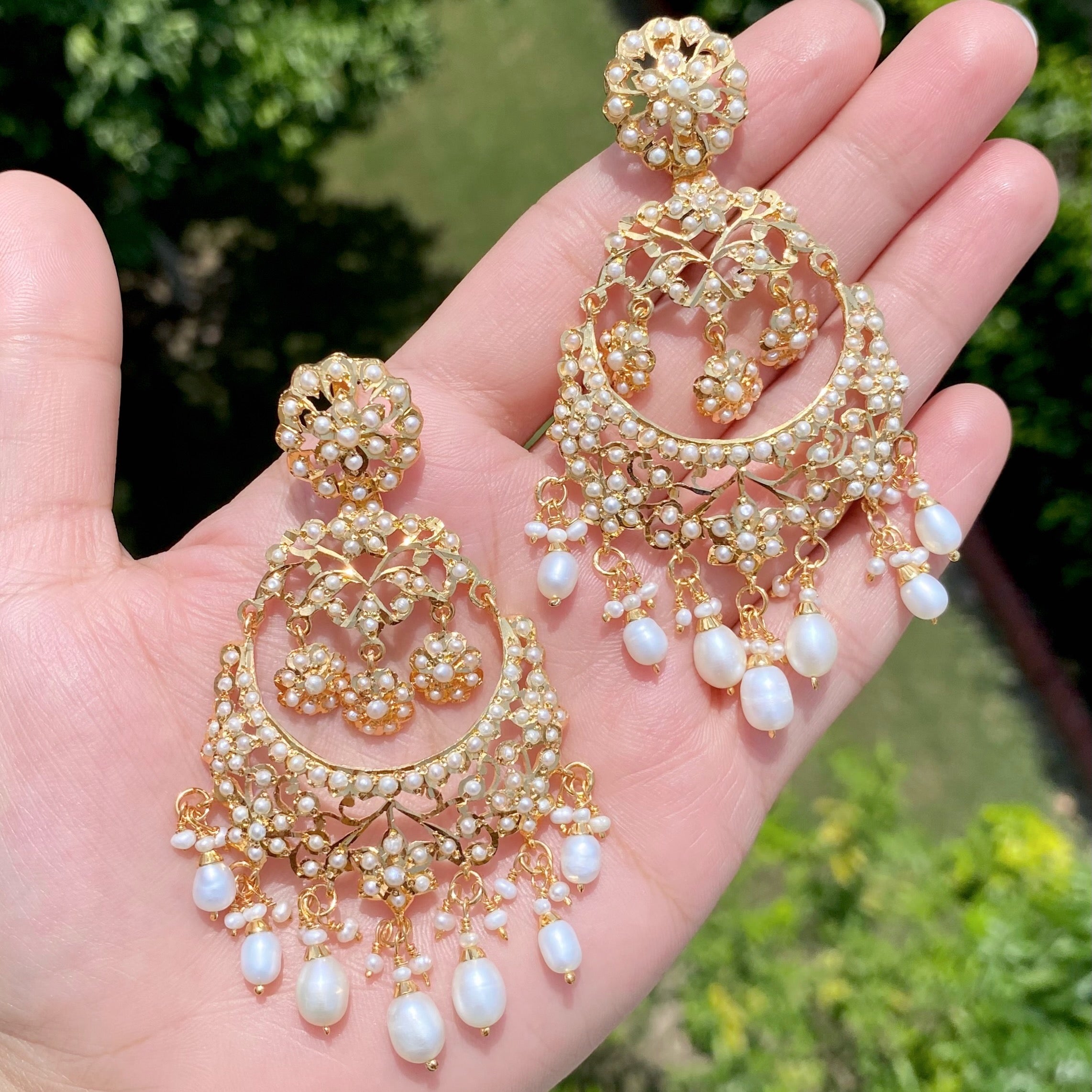 intricate jadau chandbalis on silver