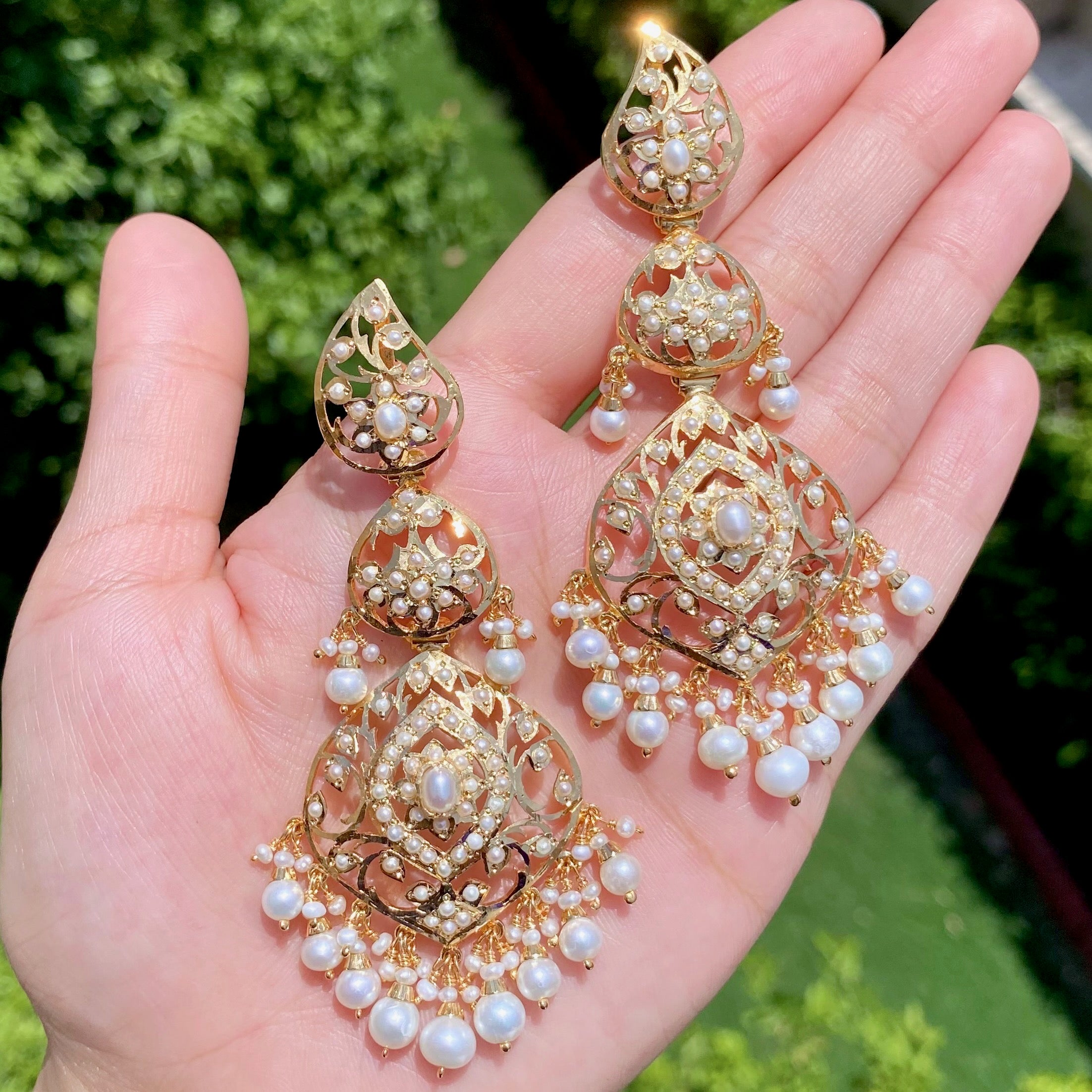 stunning jadau earrings on silver