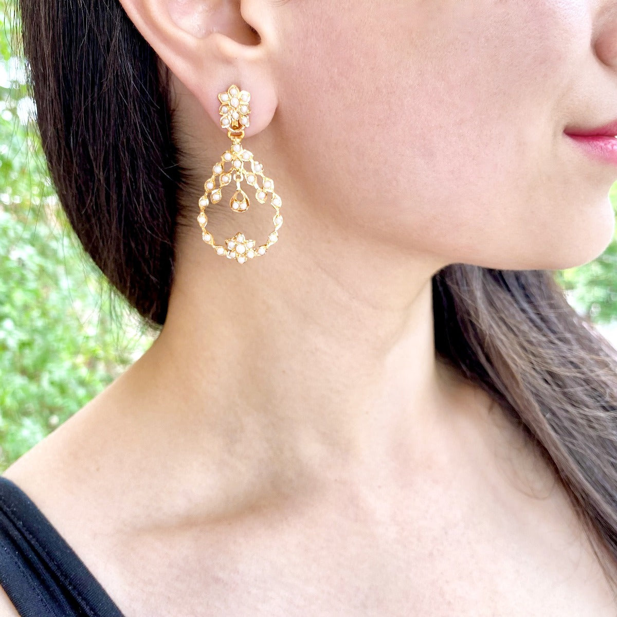 drop shaped chandbali earrings on 22 gold studded with freshwater pearls