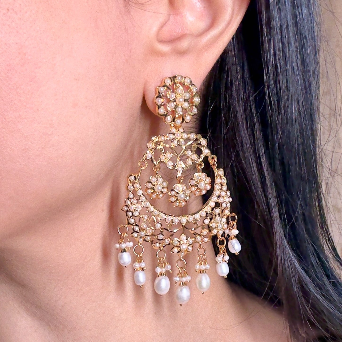 intricate jadau chandbalis on silver