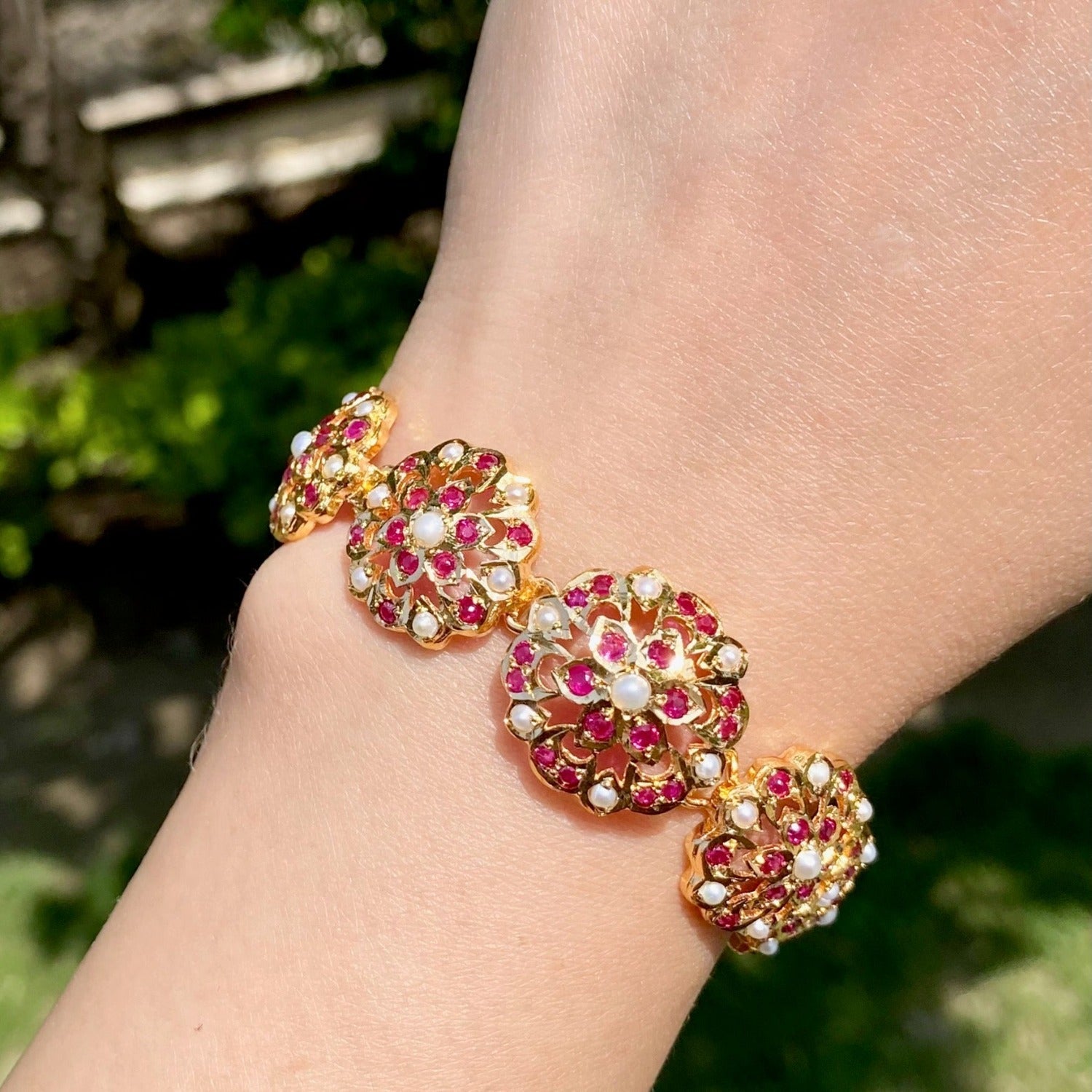 ruby bracelet on silver with gold polish