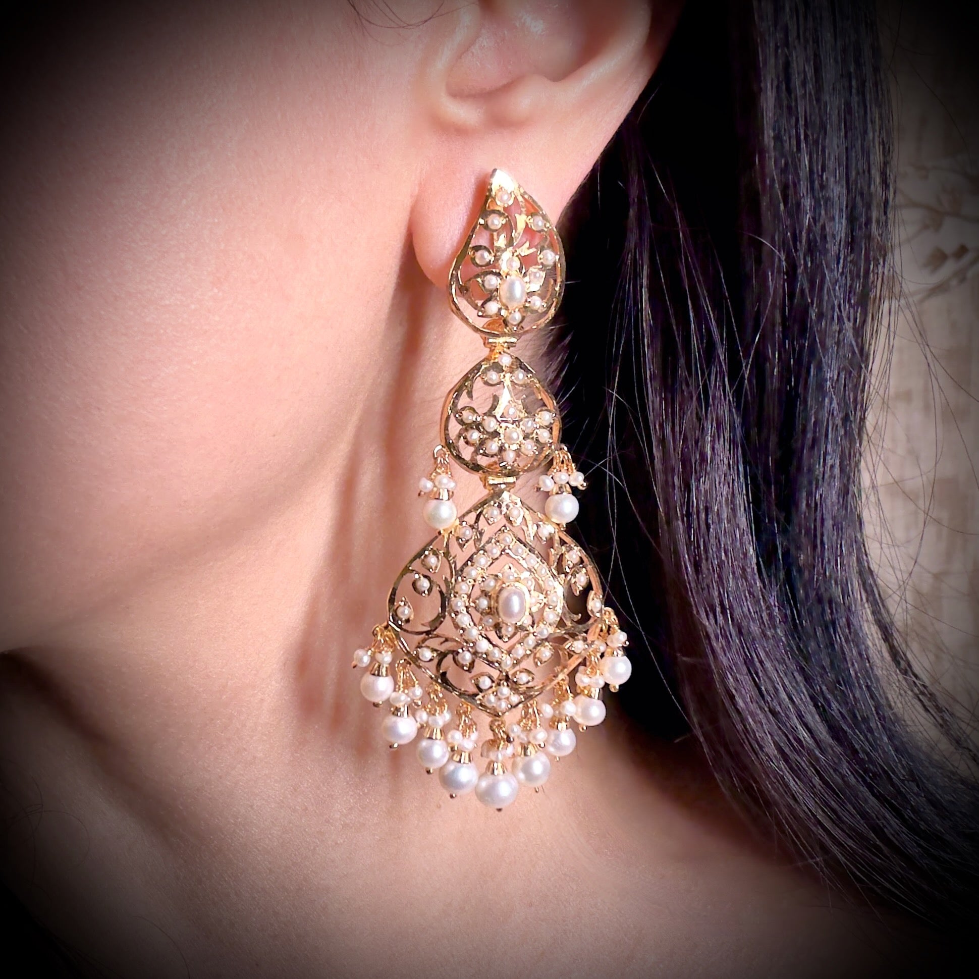 stunning jadau earrings on silver