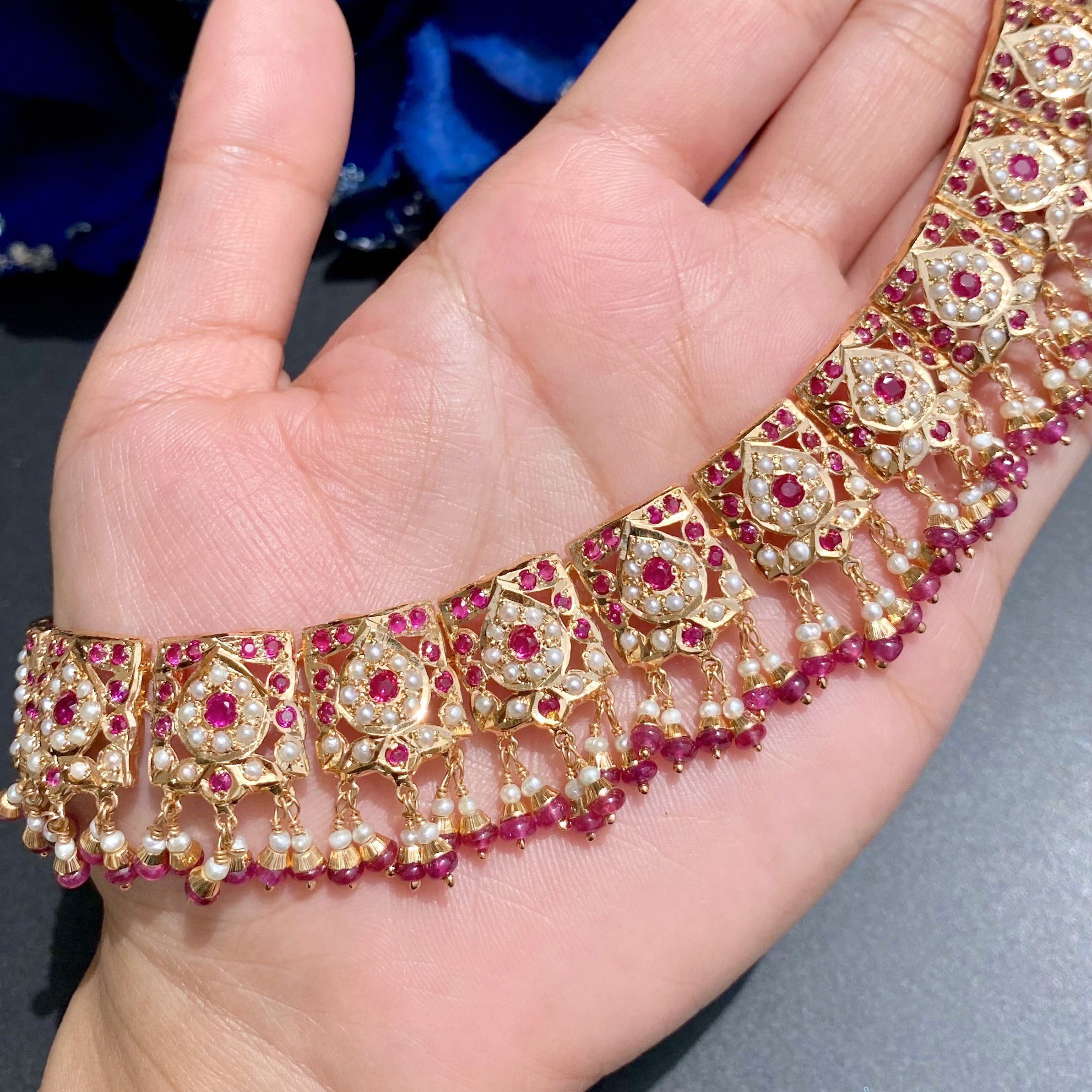 ruby necklace with jhumka earrings