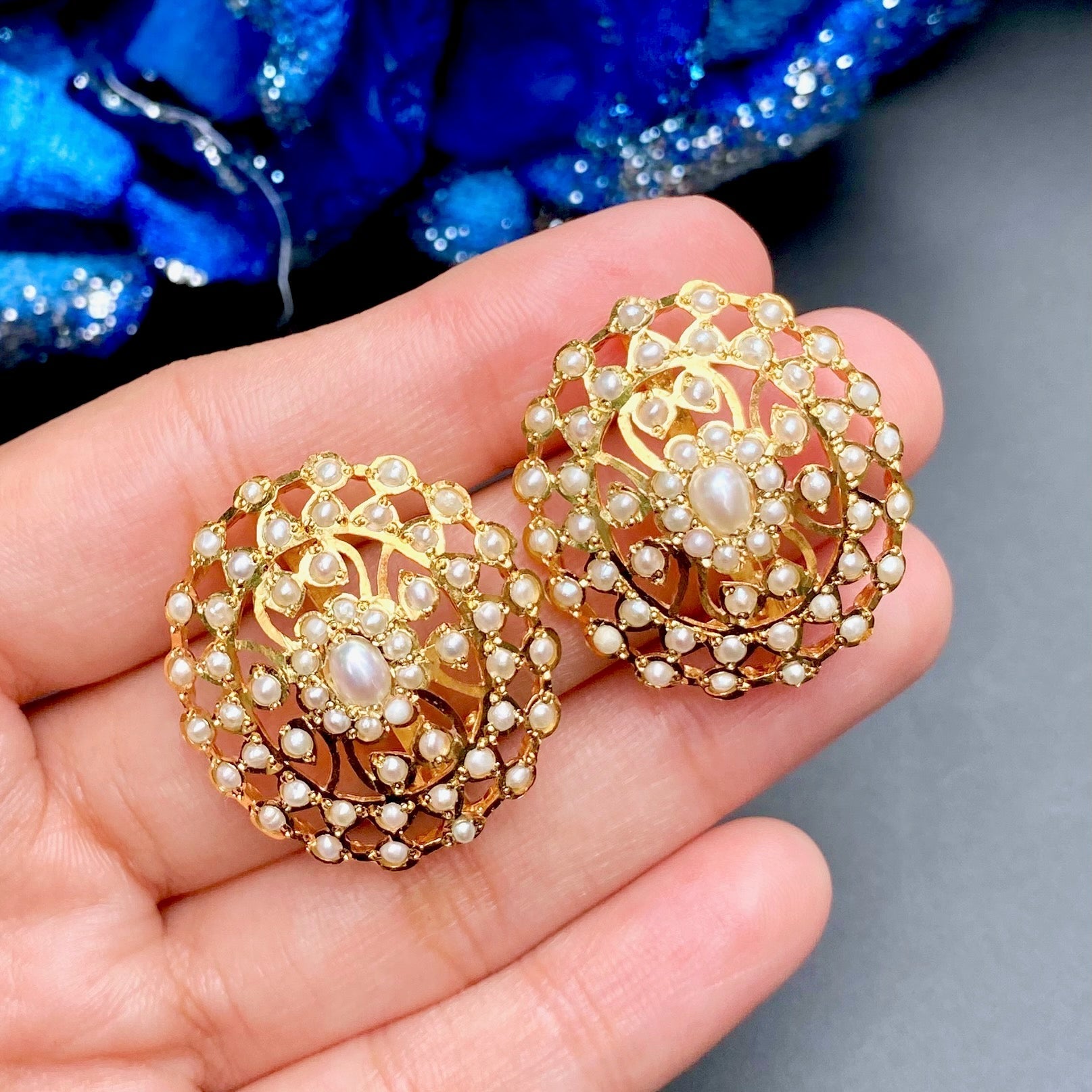 oval stud earrings studded with pearls on sterling silver with gold plating