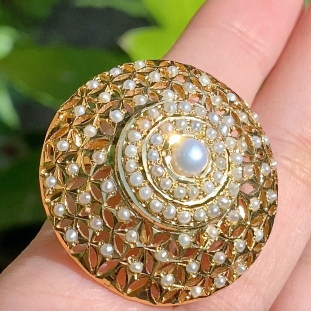 round indian gold ring studded with pearls