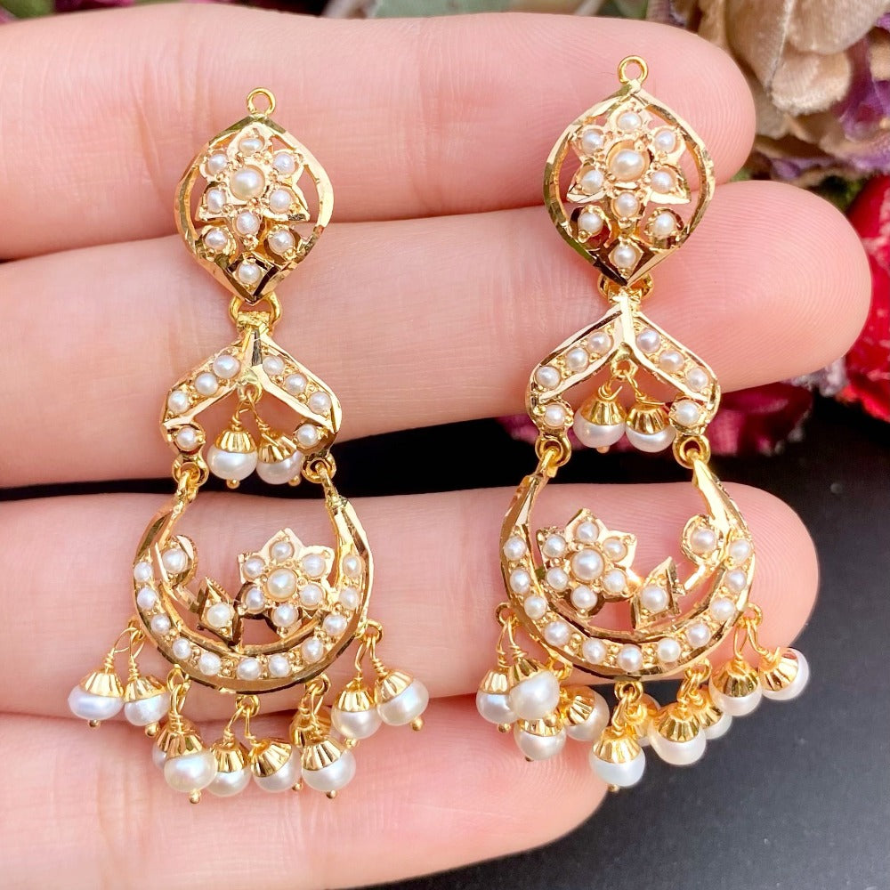 freshwater pearl earrings made in 22 carat gold and studded with real pearls.