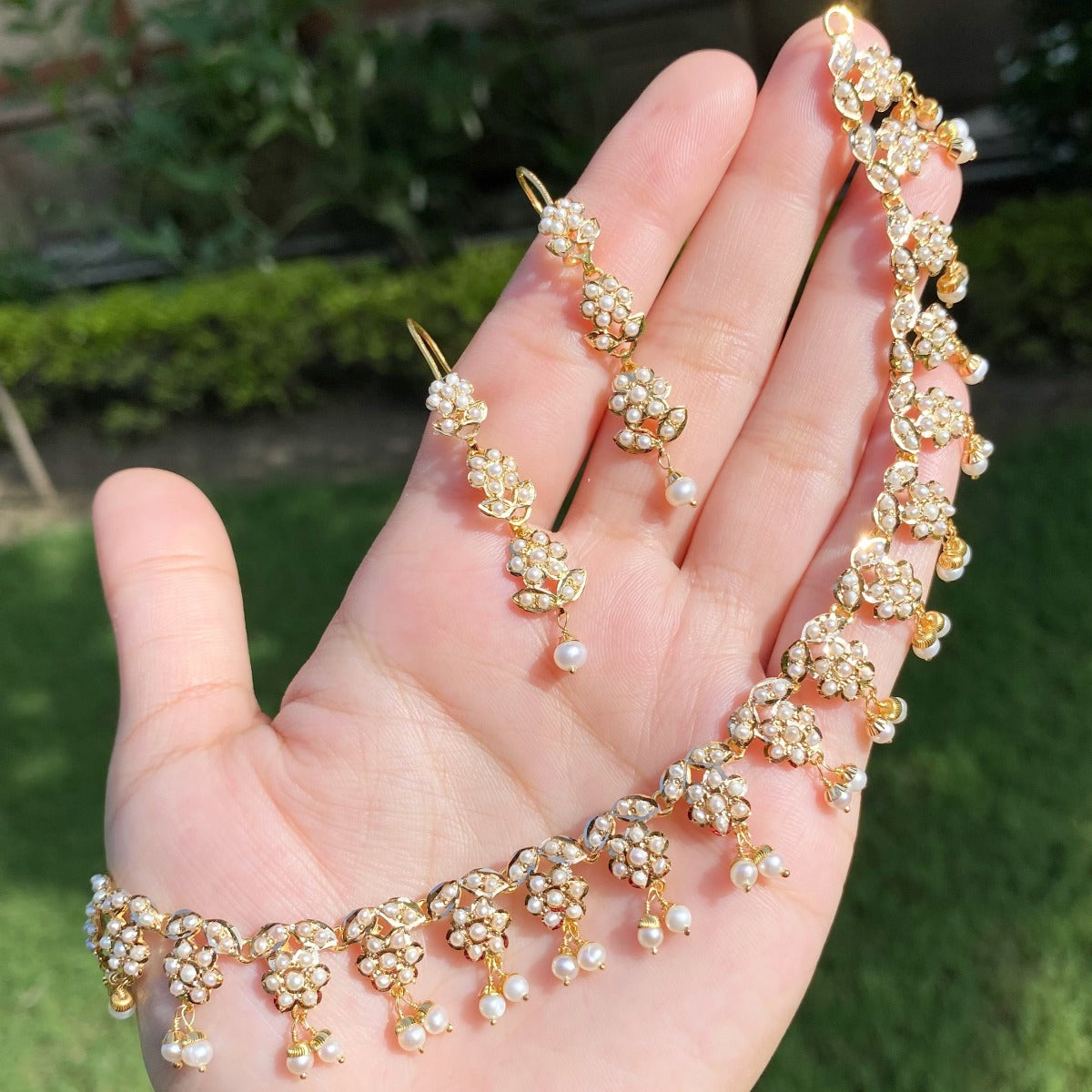 indian gold jewellery studded with real pearls