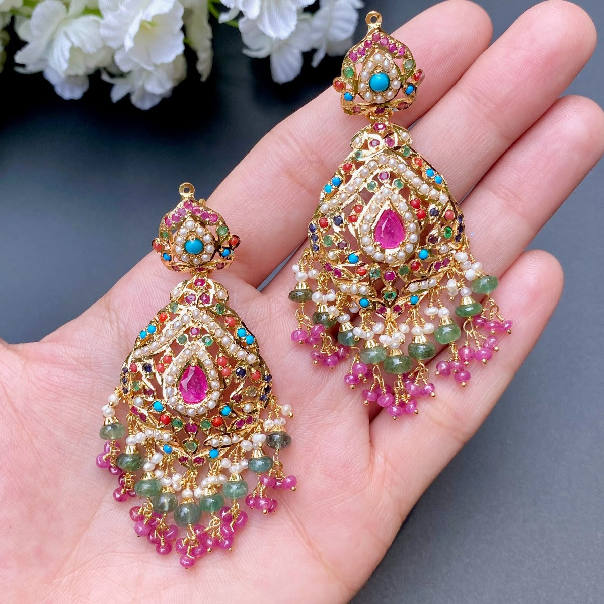 22 carat gold earrings in navratna colors suitable to be worn with lehenga