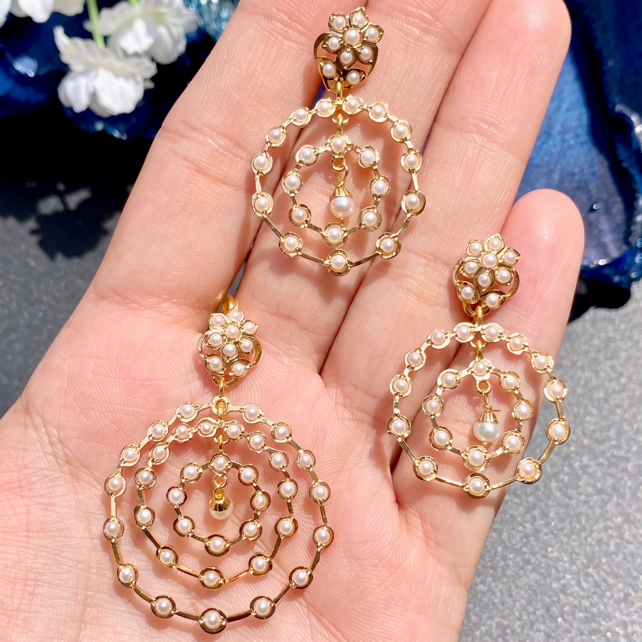 gold pendant set studded with pearls