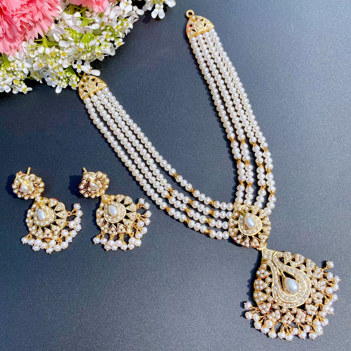 indian real pearl set on silver metal base with gold plating