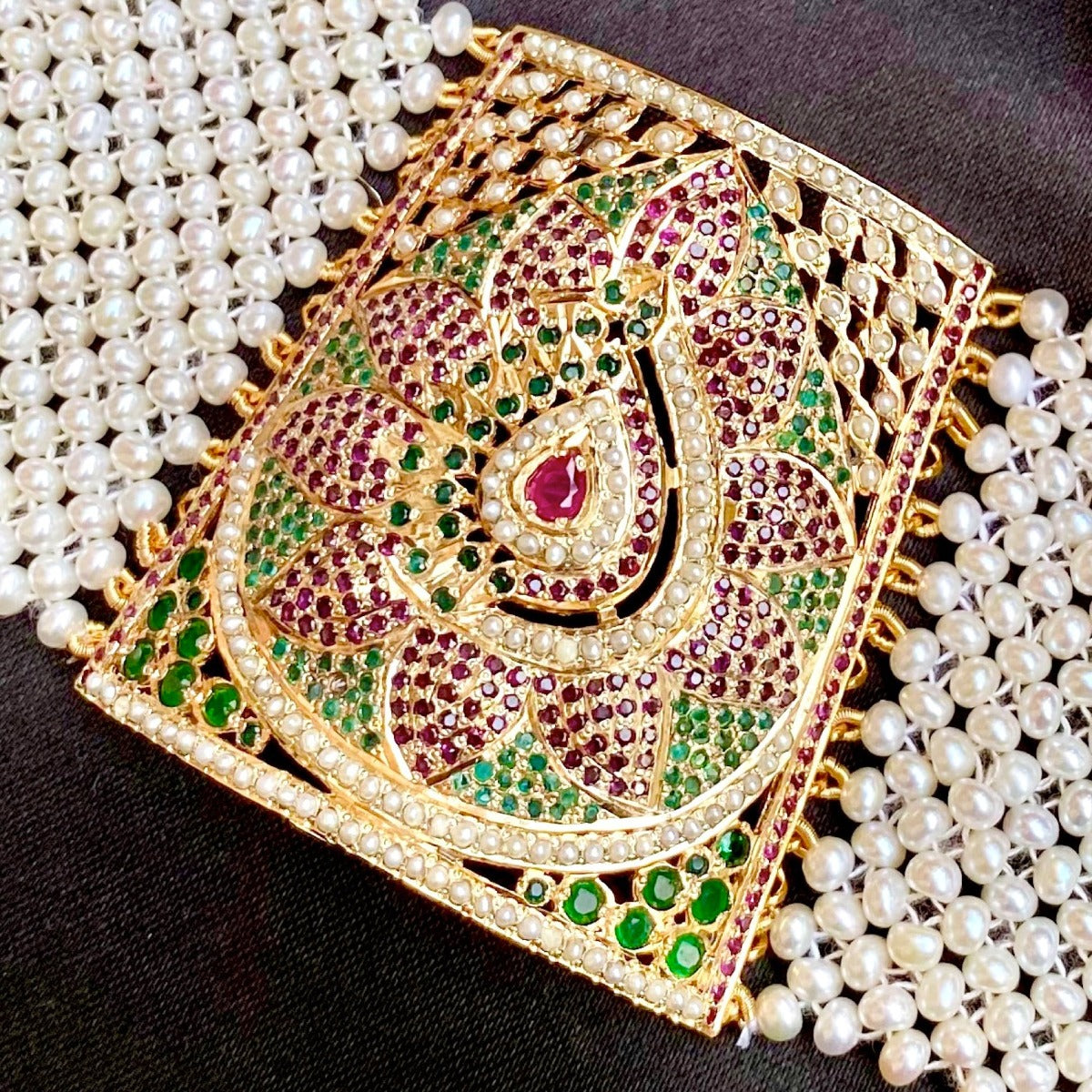 jadau bracelet studded with multicolor stones
