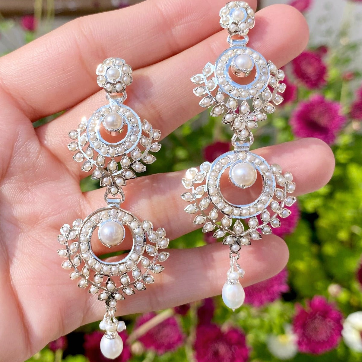 new design in silver earrings
