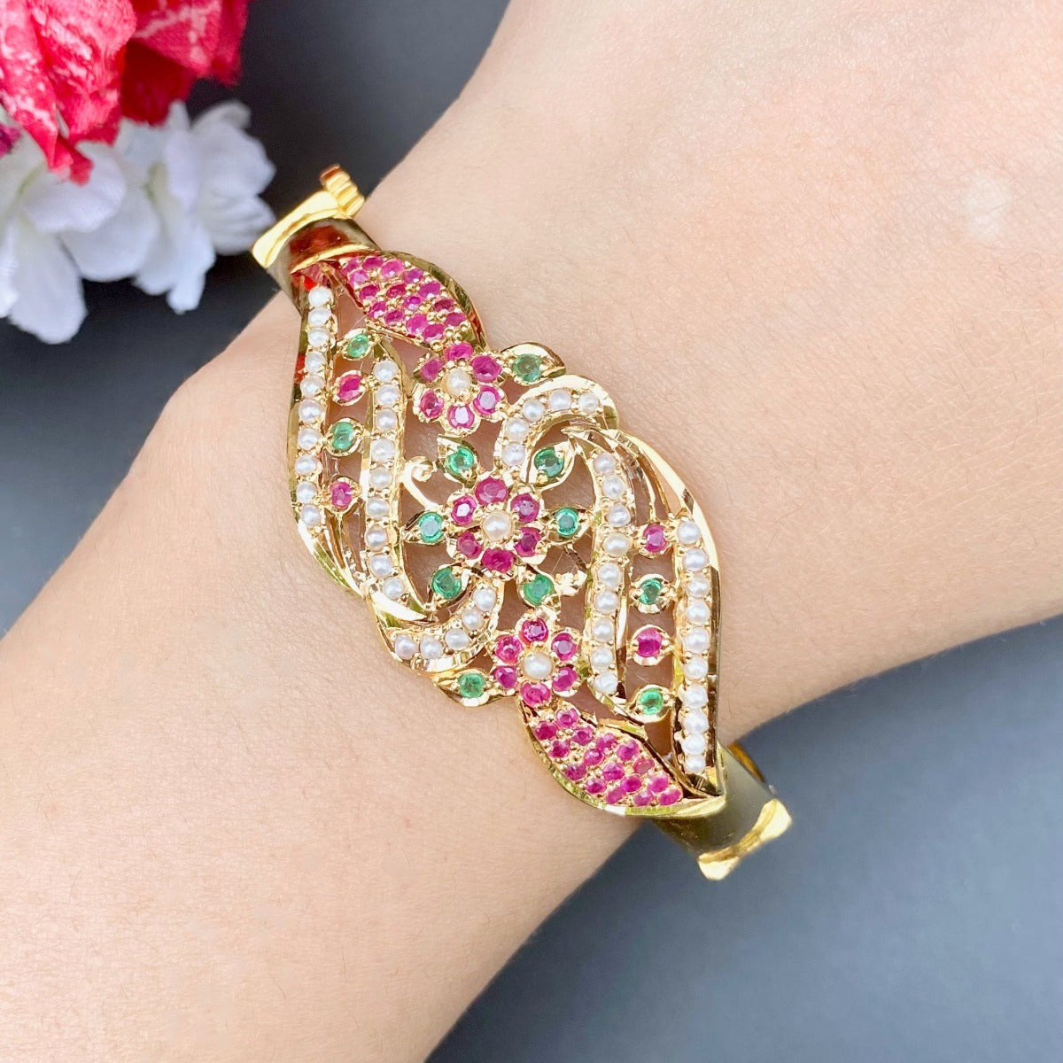 indian jadau 22 carat gold bracelet for women studded with ruby emerald and pearls