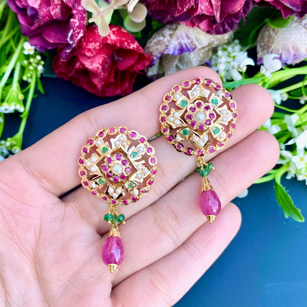 gold studs with ruby drop