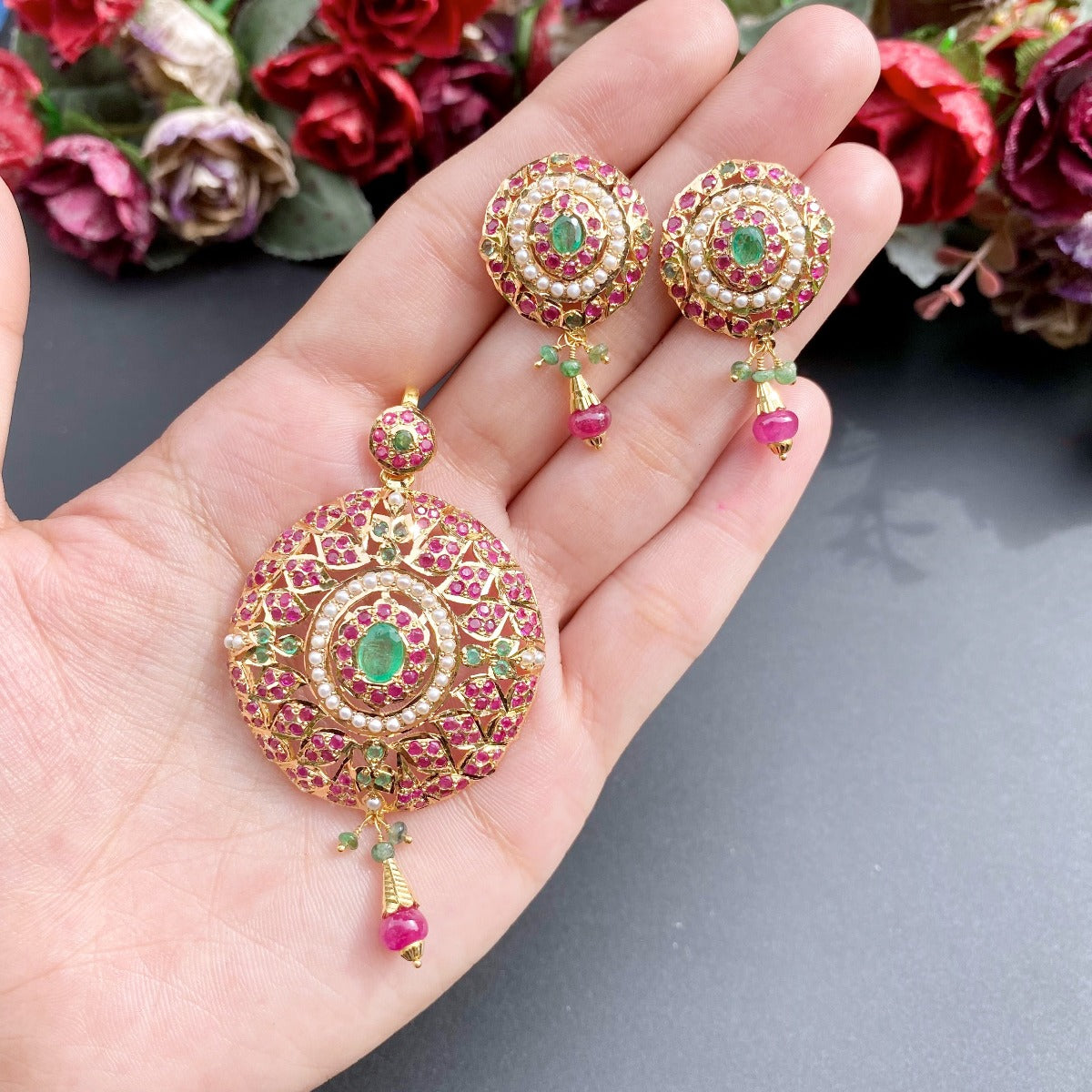 gold pendant set in jadau