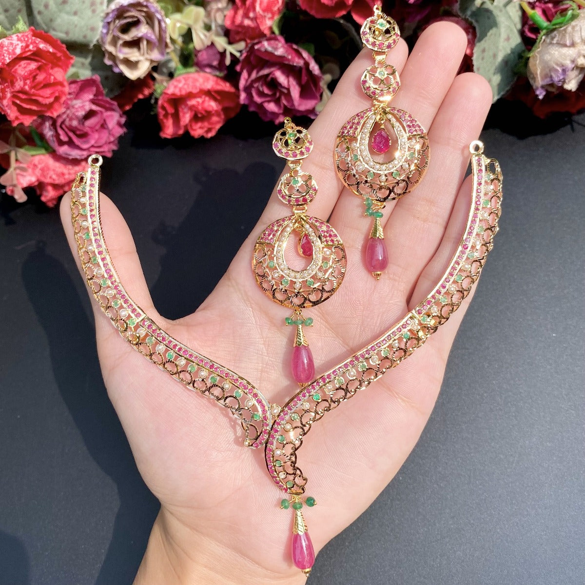 party wear  set in 22k gold under 1.5 lakh