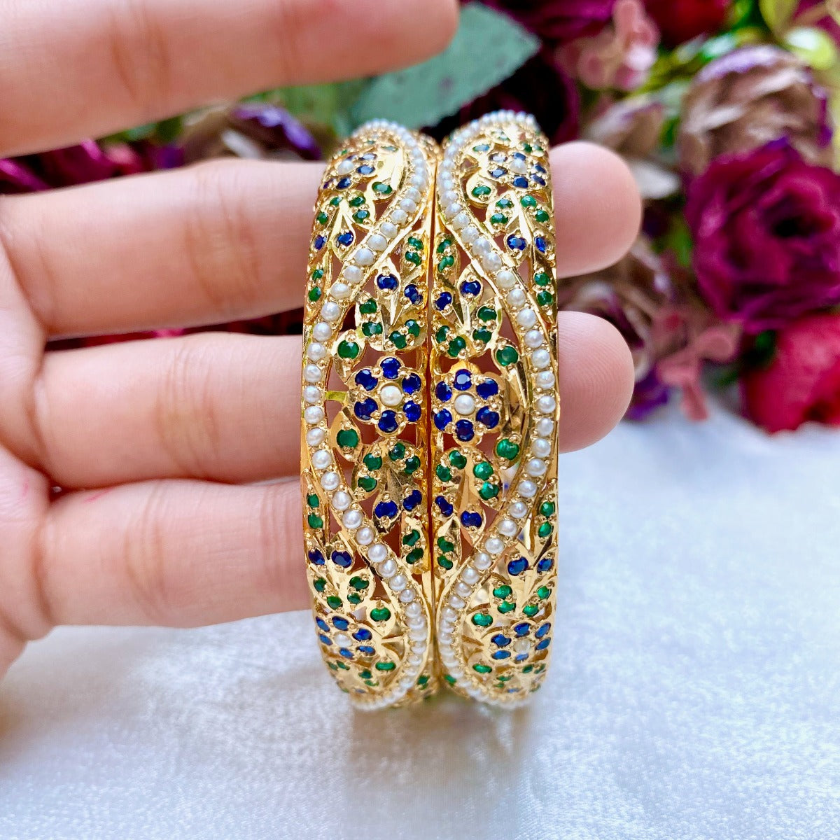 jadau bangles in gold polished sterling silver