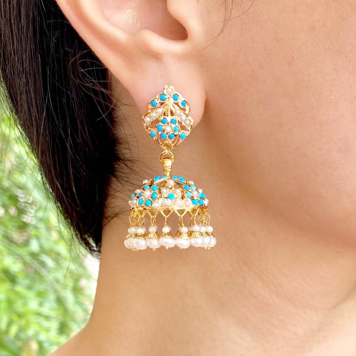 gold jhumka with firoza tanishq