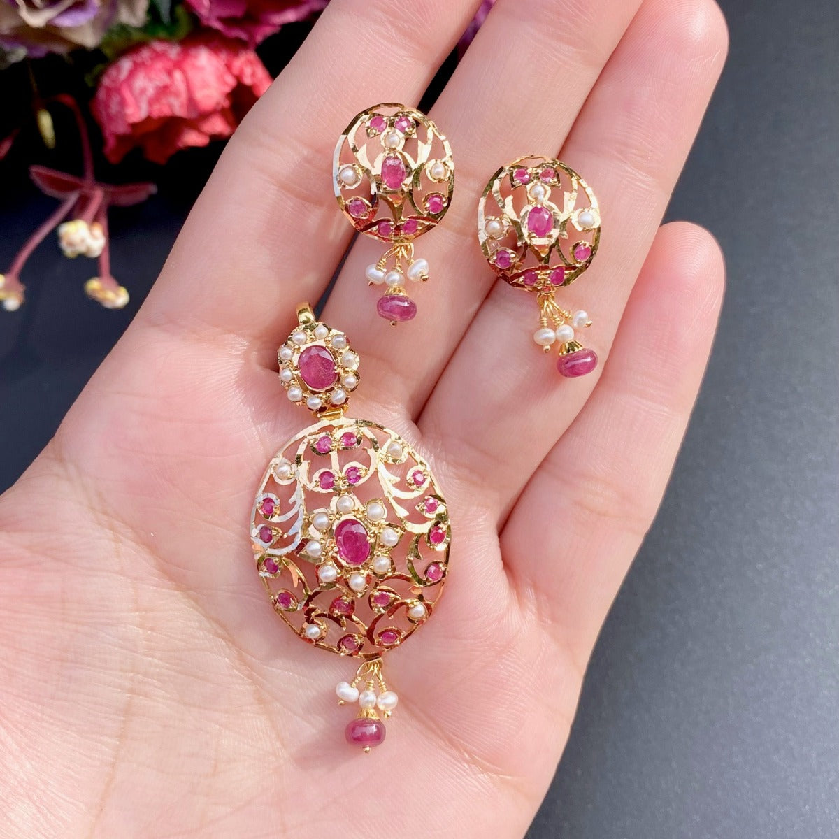 ruby pendant and earrings set in 22k gold