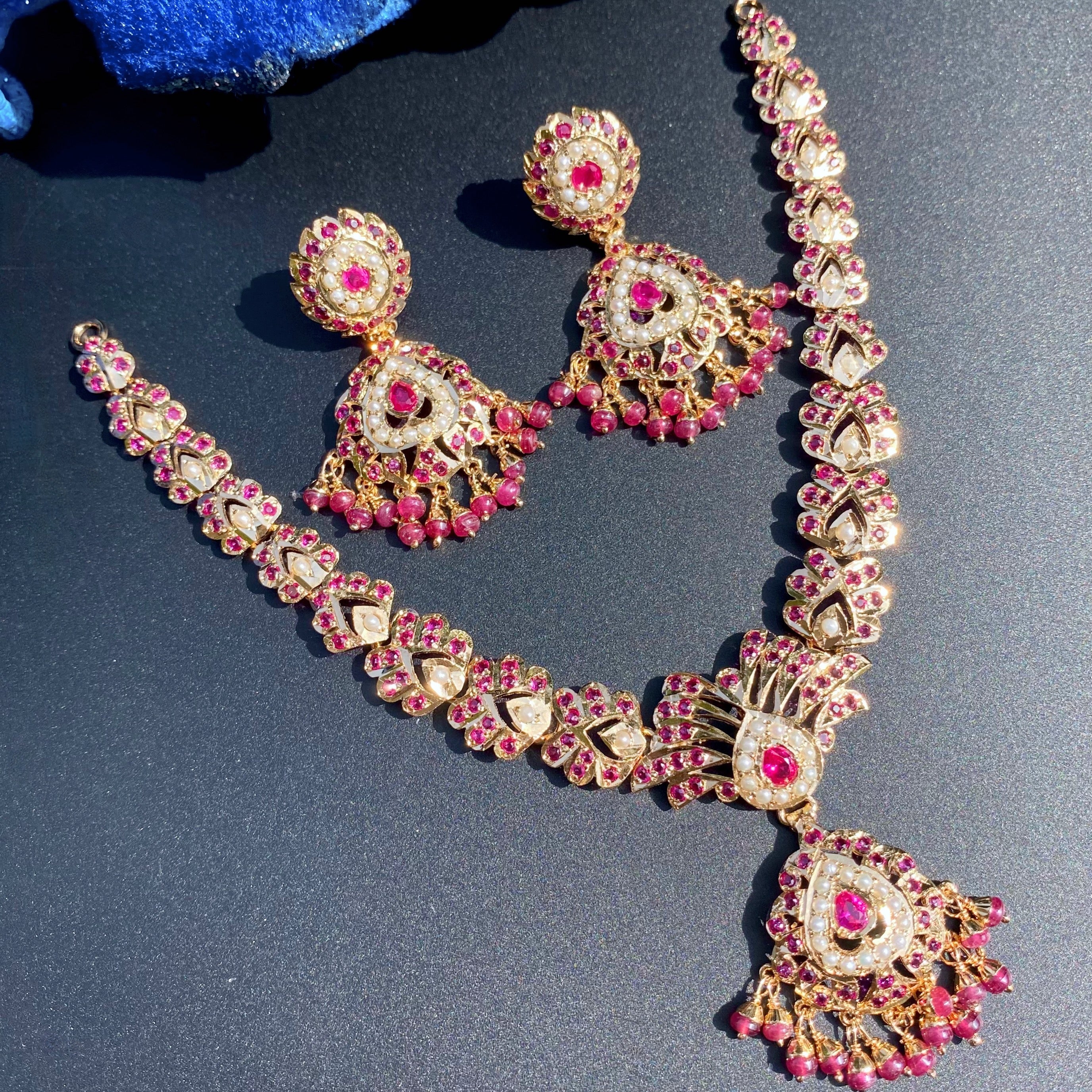 Gold Plated Jadau Necklace Set | Studded with Pearl and Red Stones NS 046