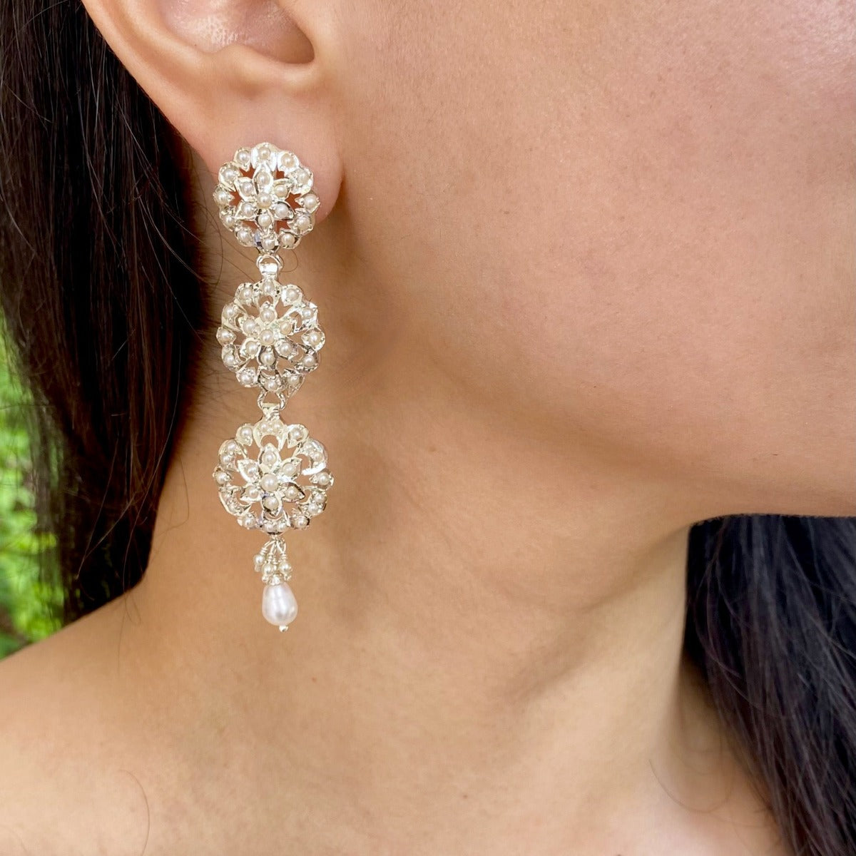 bright silver earrings with pearls