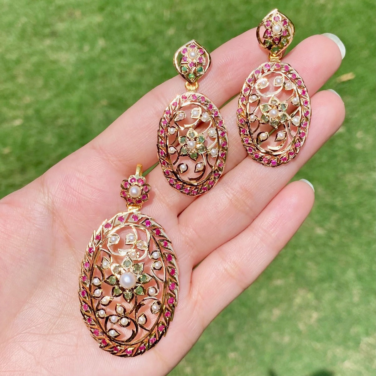 classy bengali gold pendant and earrings for women with rubies emeralds and pearls